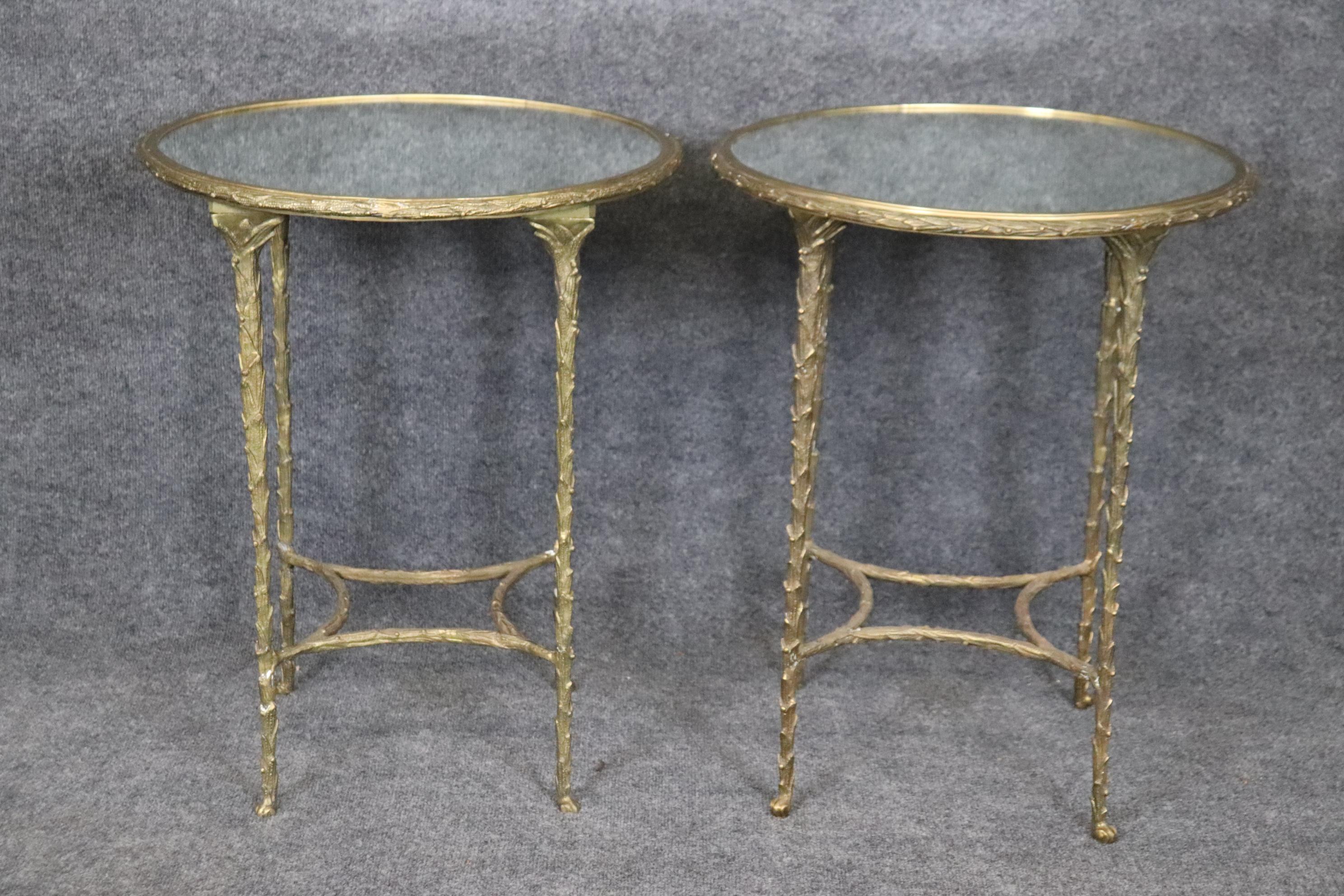 Dimensions- H: 25 3/4in W: 21in D: 21in

This pair of Mid Century faux bois mirrored top end tables, attributed to Maison Bagues, is made of the highest quality brass! The brass castings were done to look like wood, this gives the end tables a