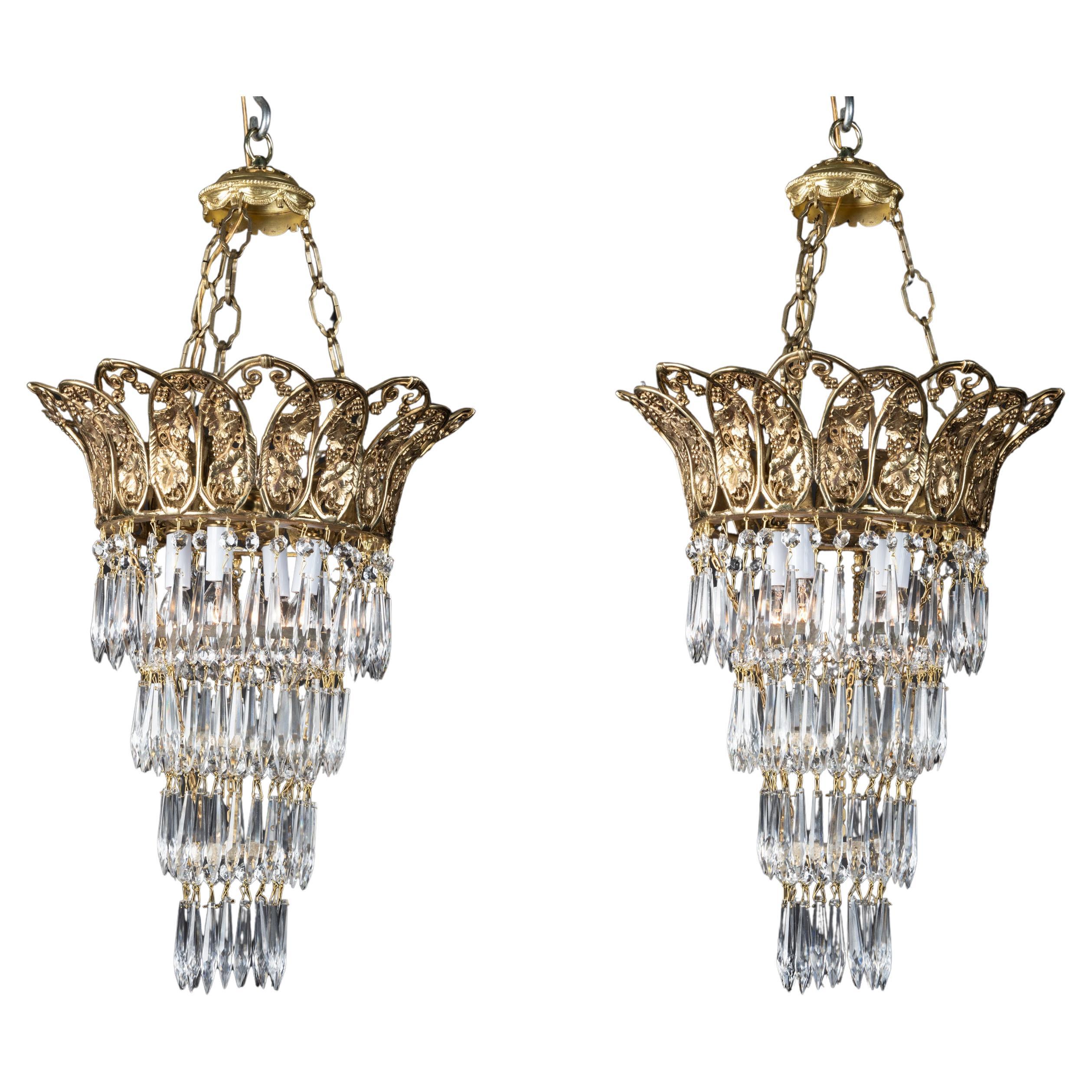 Pair of Louis XVI Bronze Chandeliers with Crystals For Sale