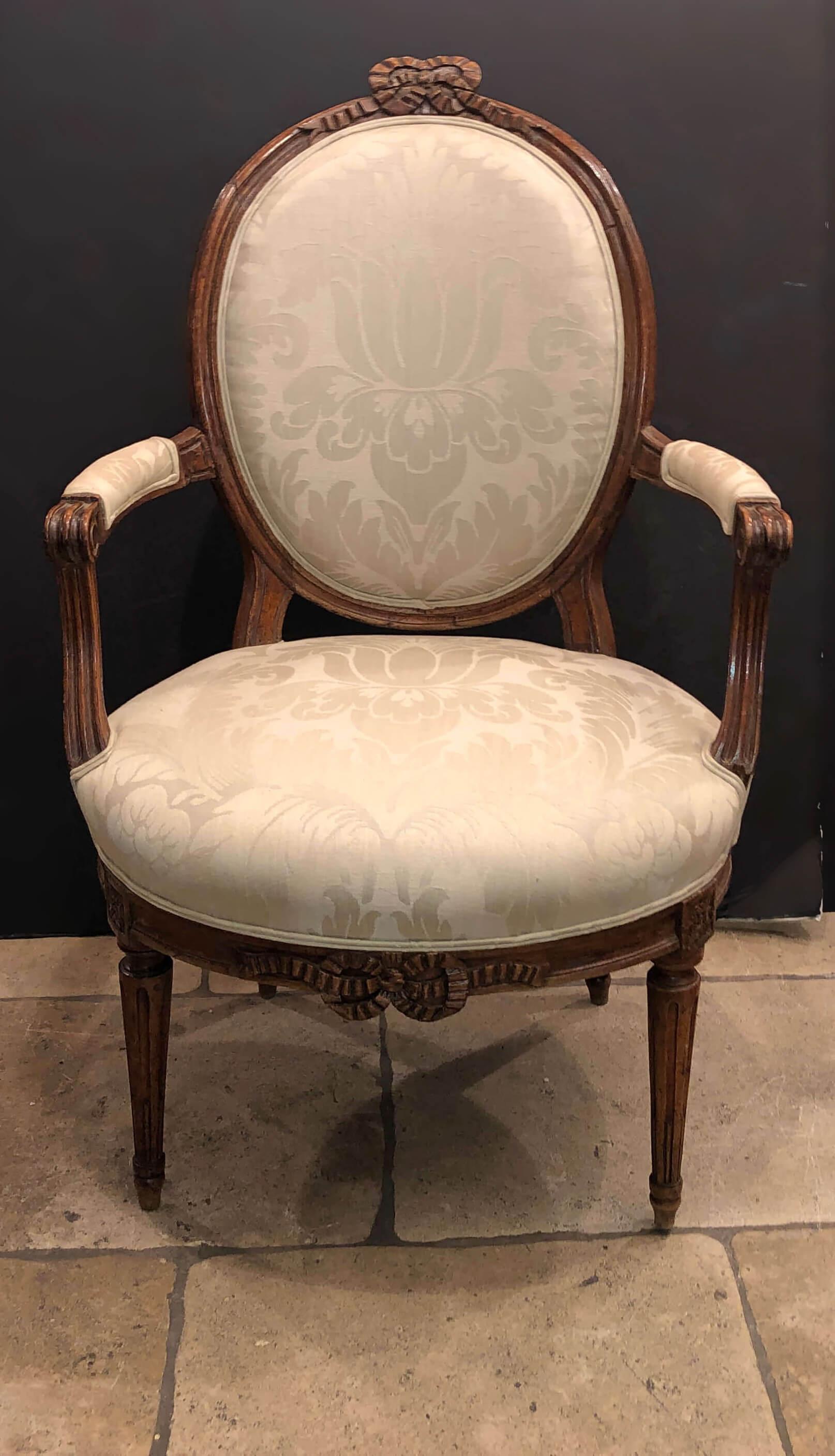 French Pair of Louis XVI Carved Bowknot Fauteuils