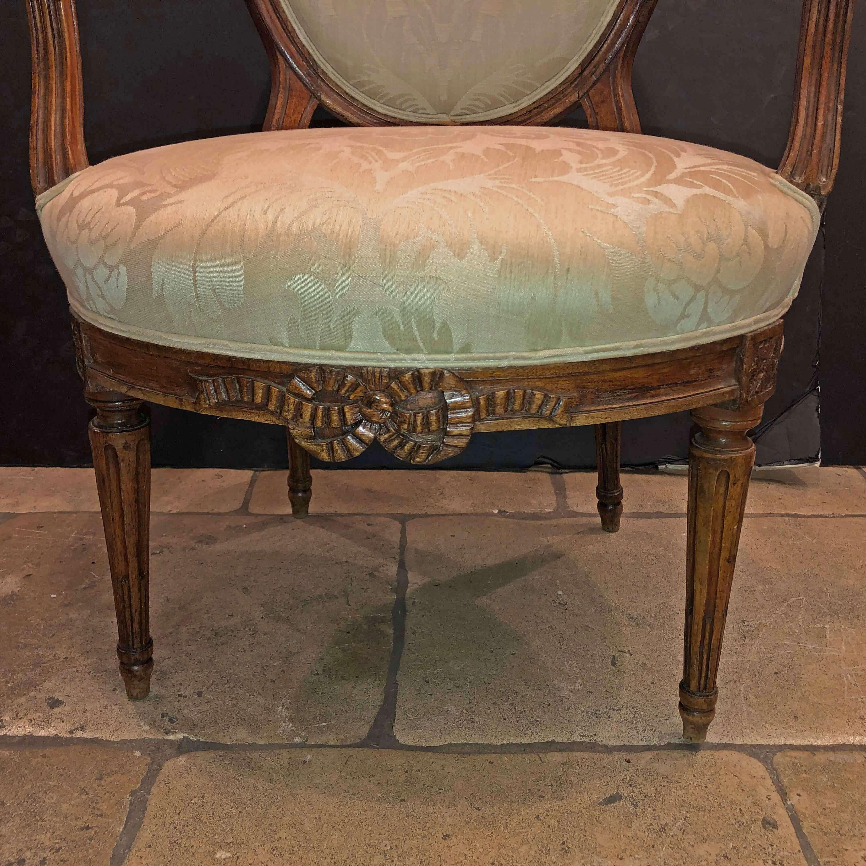 Late 18th Century Pair of Louis XVI Carved Bowknot Fauteuils