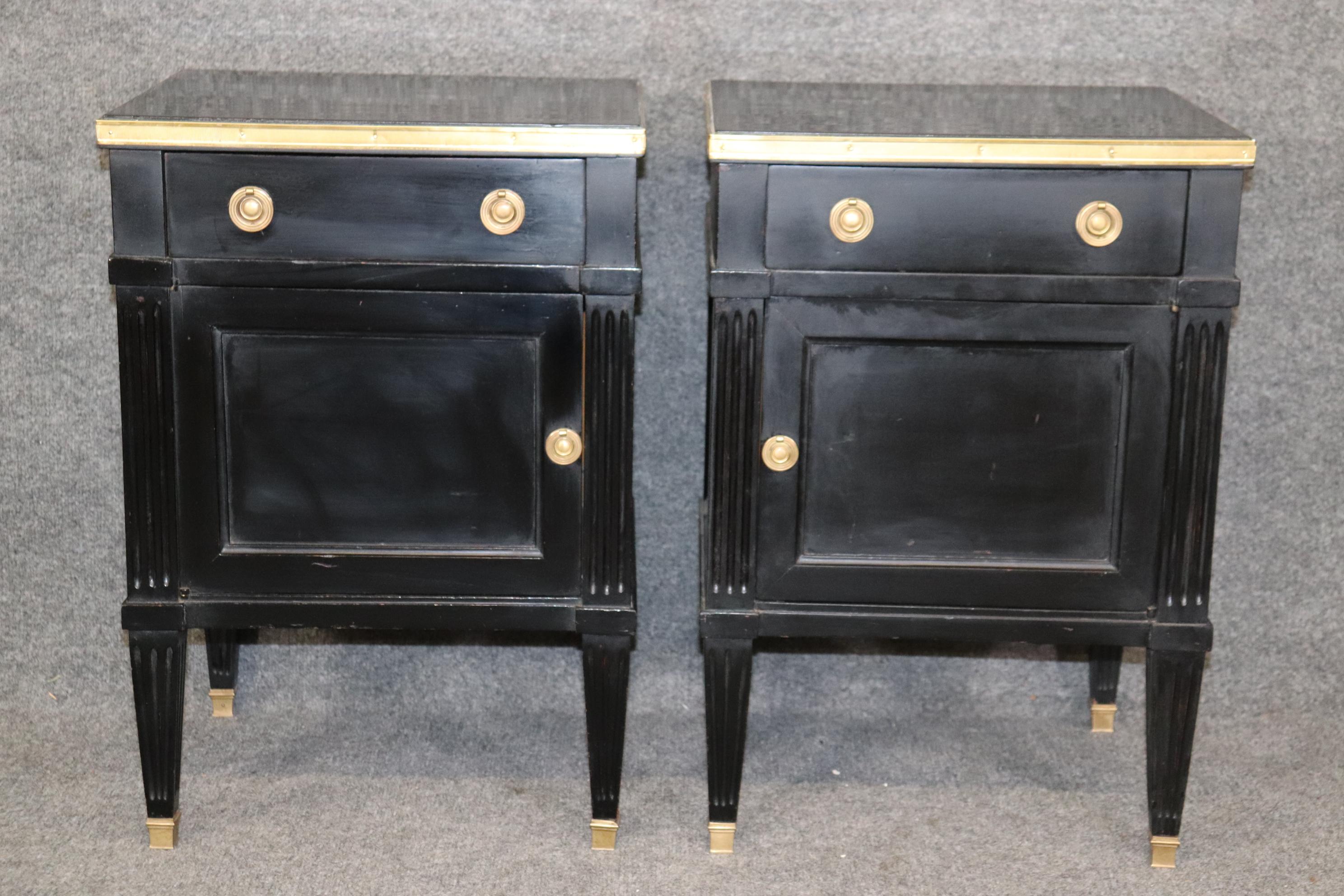 Dimensions- H: 33in W: 61 1/4in D: 17 1/2in
This Pair of Louis XVI Directoire Style Ebonized Nightstands Signed By Maison Jansen Circa 1950 are truly exceptional and are super rare!  If you look at the photos provided you will see the black