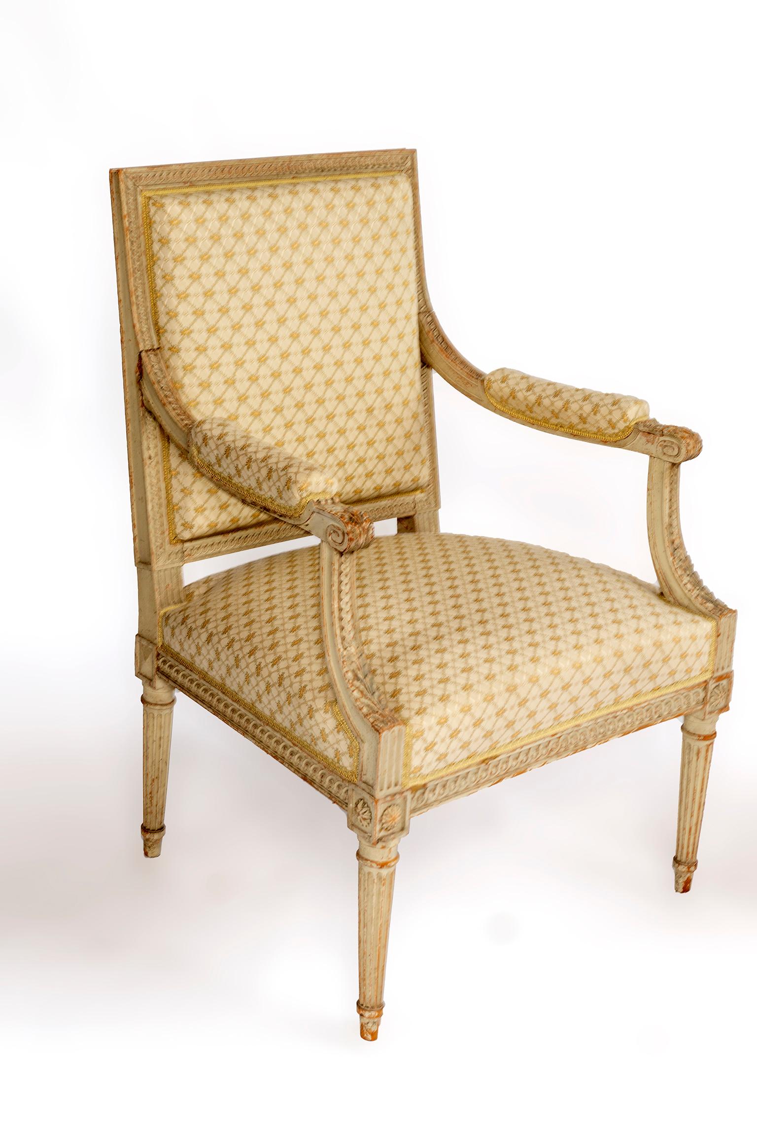 Pair of 18th Century Louis XVI Fauteuils with detailed hand carving and fluted legs.