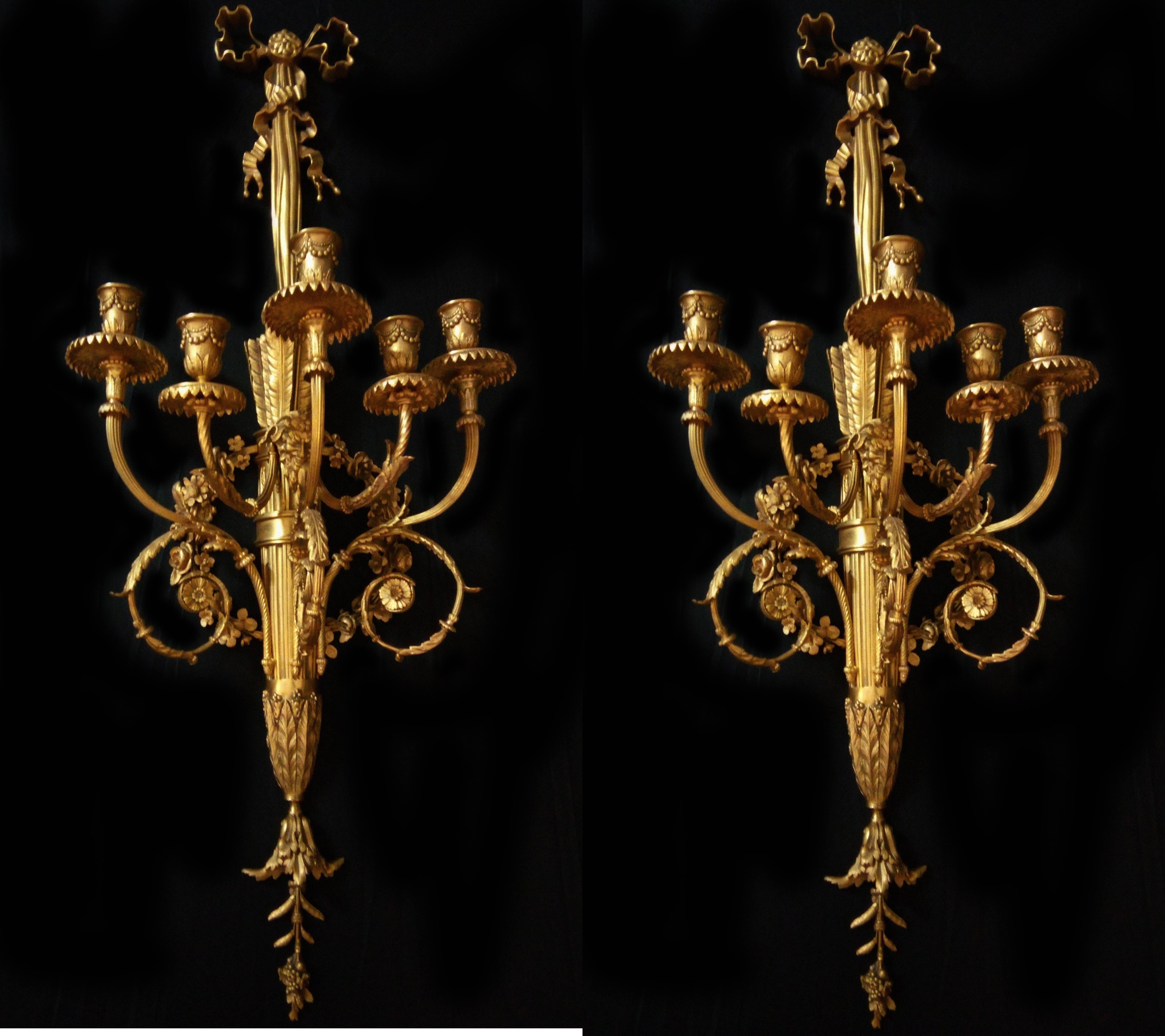Pair of Louis XVI gilded golden gilded bronze sconces with five lights.
 