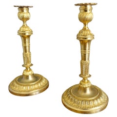 Pareja de candeleros Luis XVI de bronce dorado - ormolu - S. XIX