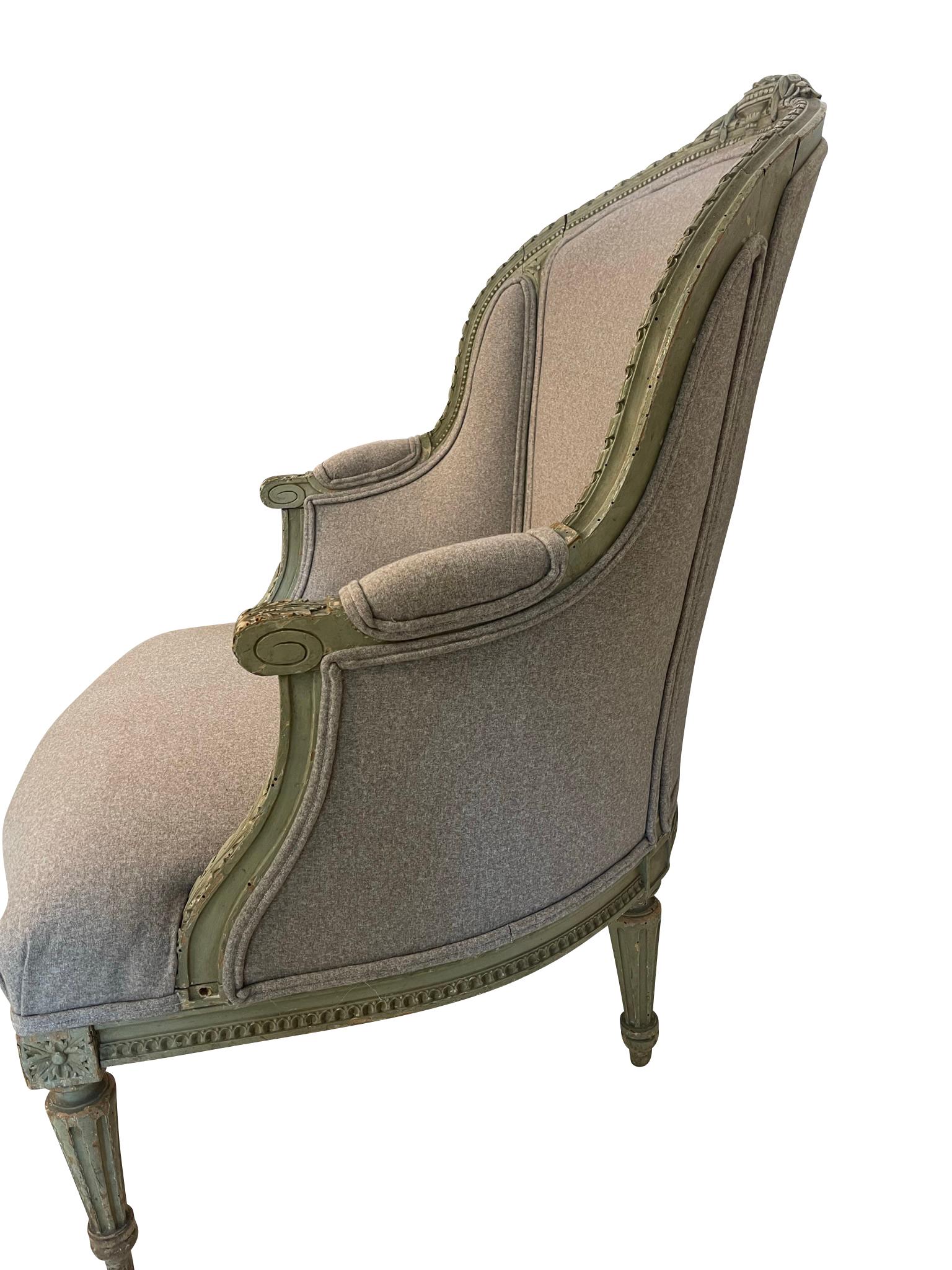 French Pair of Louis XVI Green Painted Bergeres in Grey Upholstery with Flower Detail For Sale