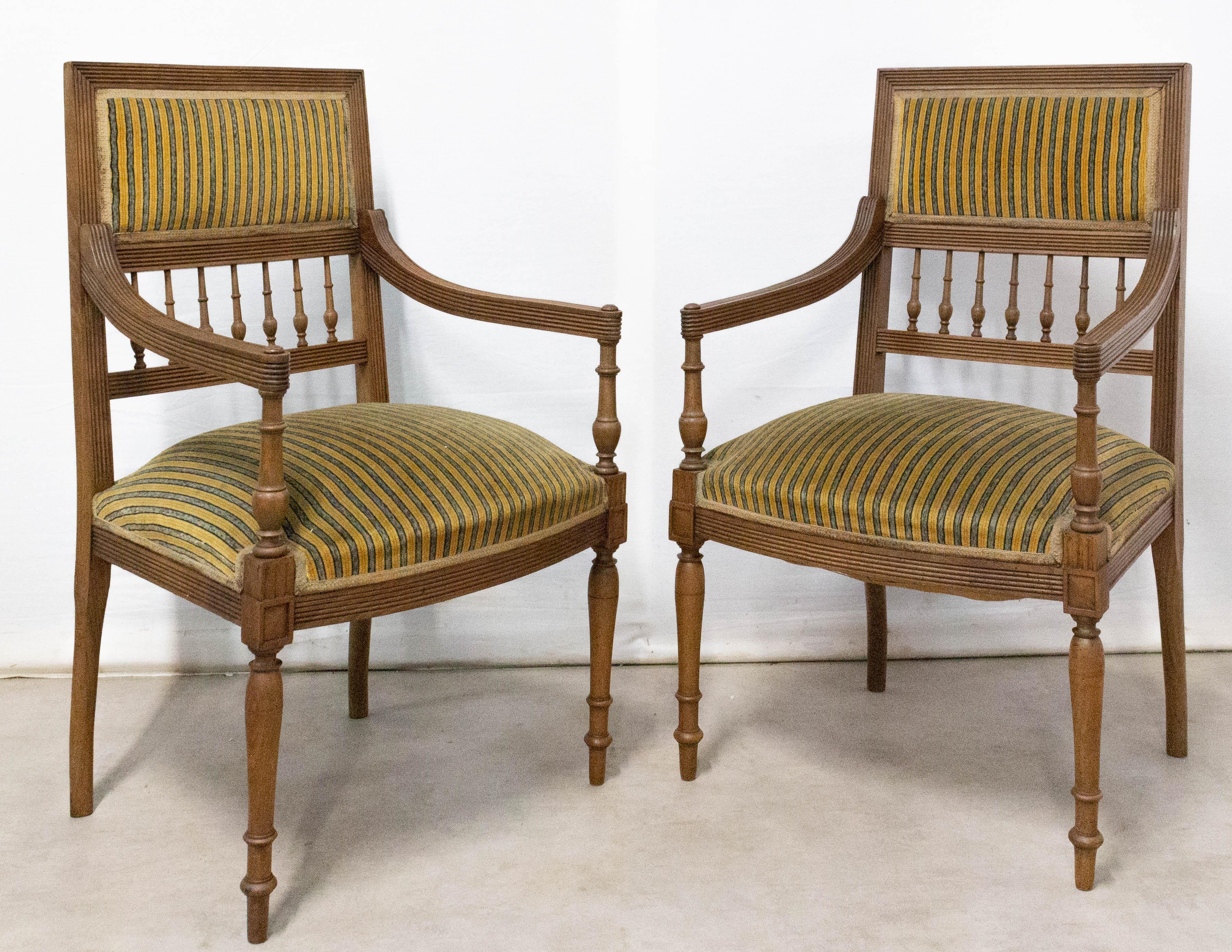 Pair of French open armchairs side or desk chairs Louis XVI revival,
circa 1900
The fabric can easily be changed to wear with your interior, 
The upholstery is the original: suitable but a bit old.
Good condition
Frames sound and solid.

For
