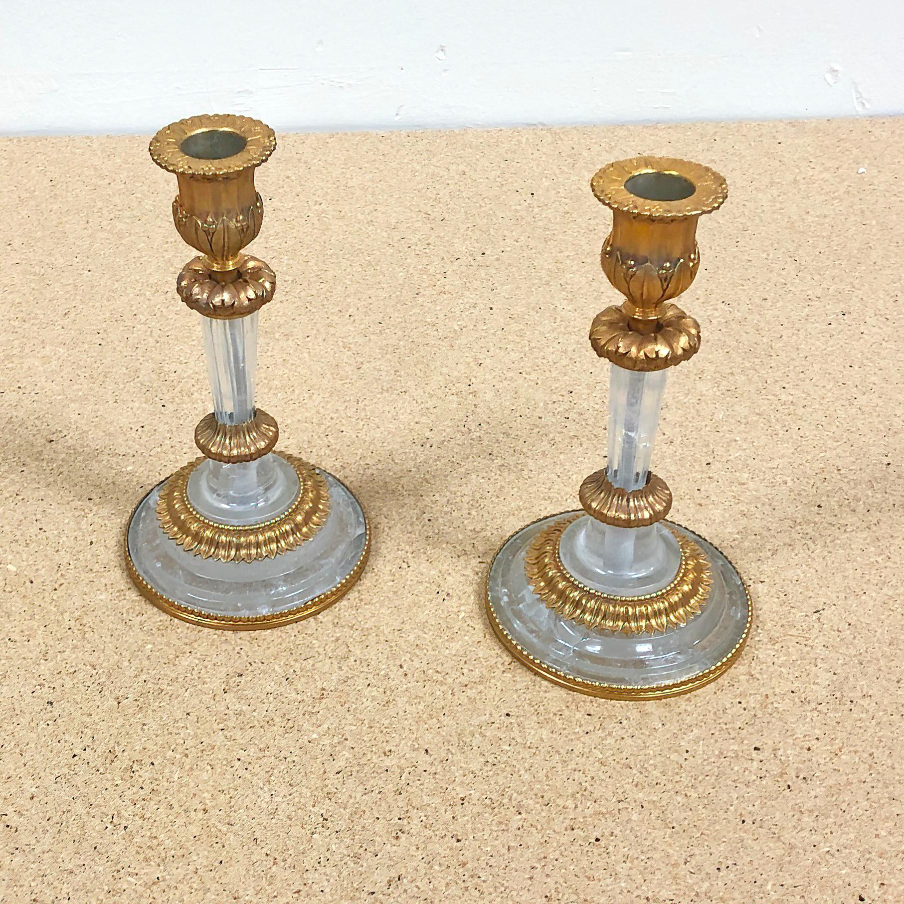 Pair of French Louis XVI style bronze and rock crystal candlesticks.