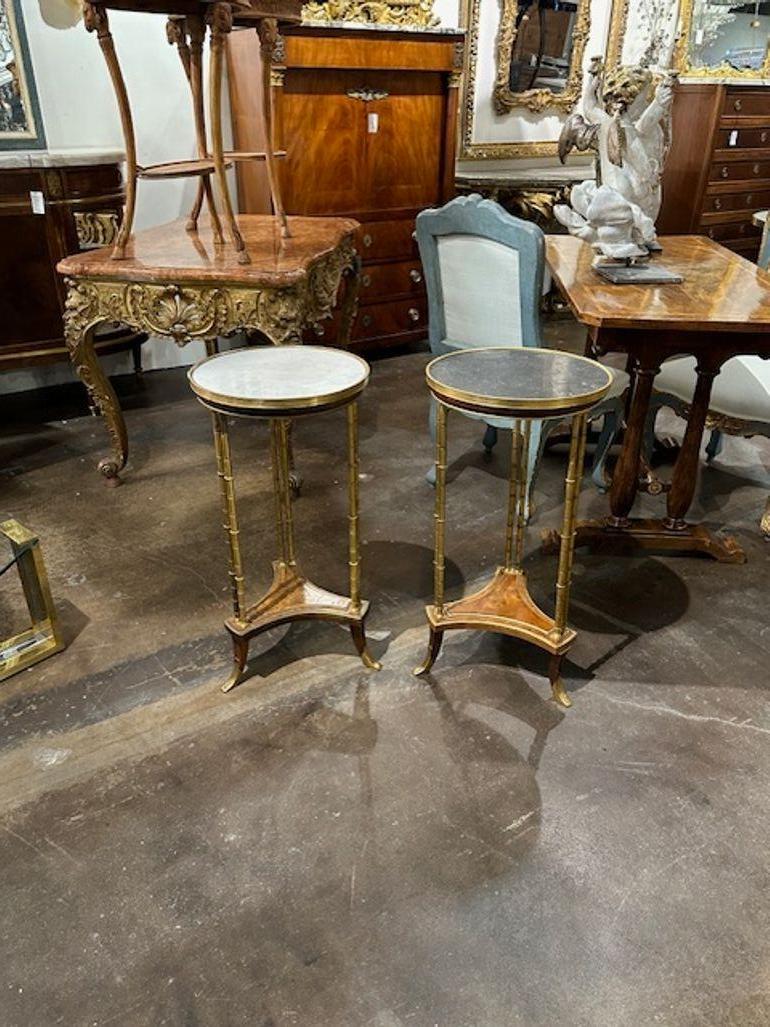 Pair of 19th century French Louis XVI gilt bronze and marble side tables after Adam Weisweiler. Circa 1870. A favorite of top designers!