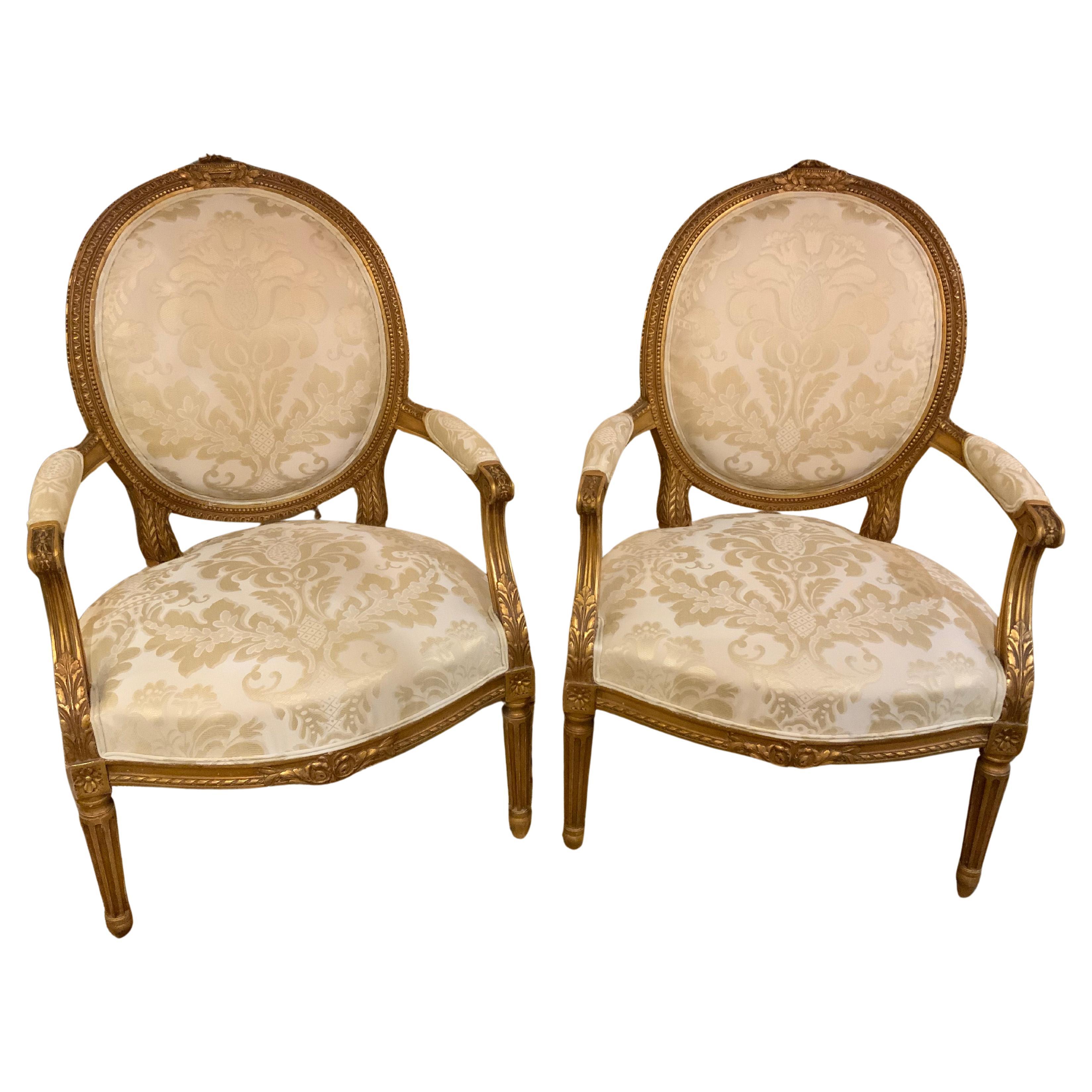 Pair of Louis XVI-style arm chairs gilt wood, 19 th century