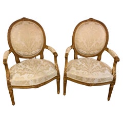 Pair of Louis XVI-style arm chairs gilt wood, 19 th century