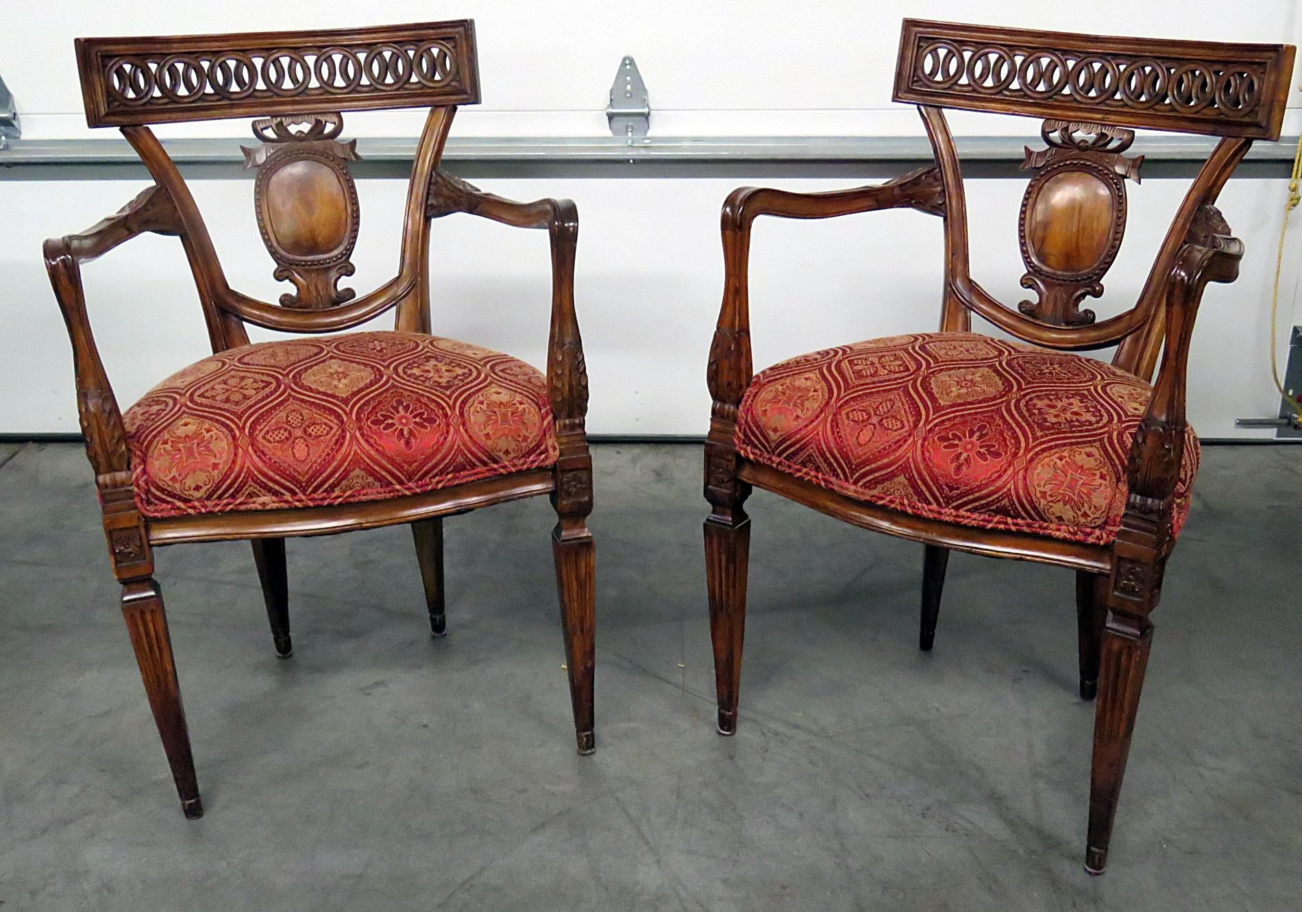 Pair of Louis XVI style carved armchairs.