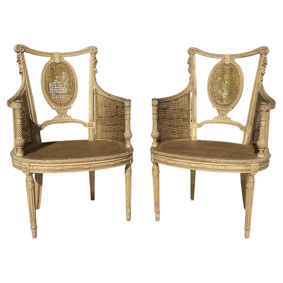 Paire de fauteuils de style Louis XVI en vente