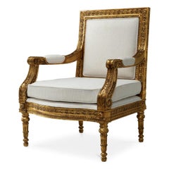 Pair of Louis XVI Style Armchairs in Gilded Wood.