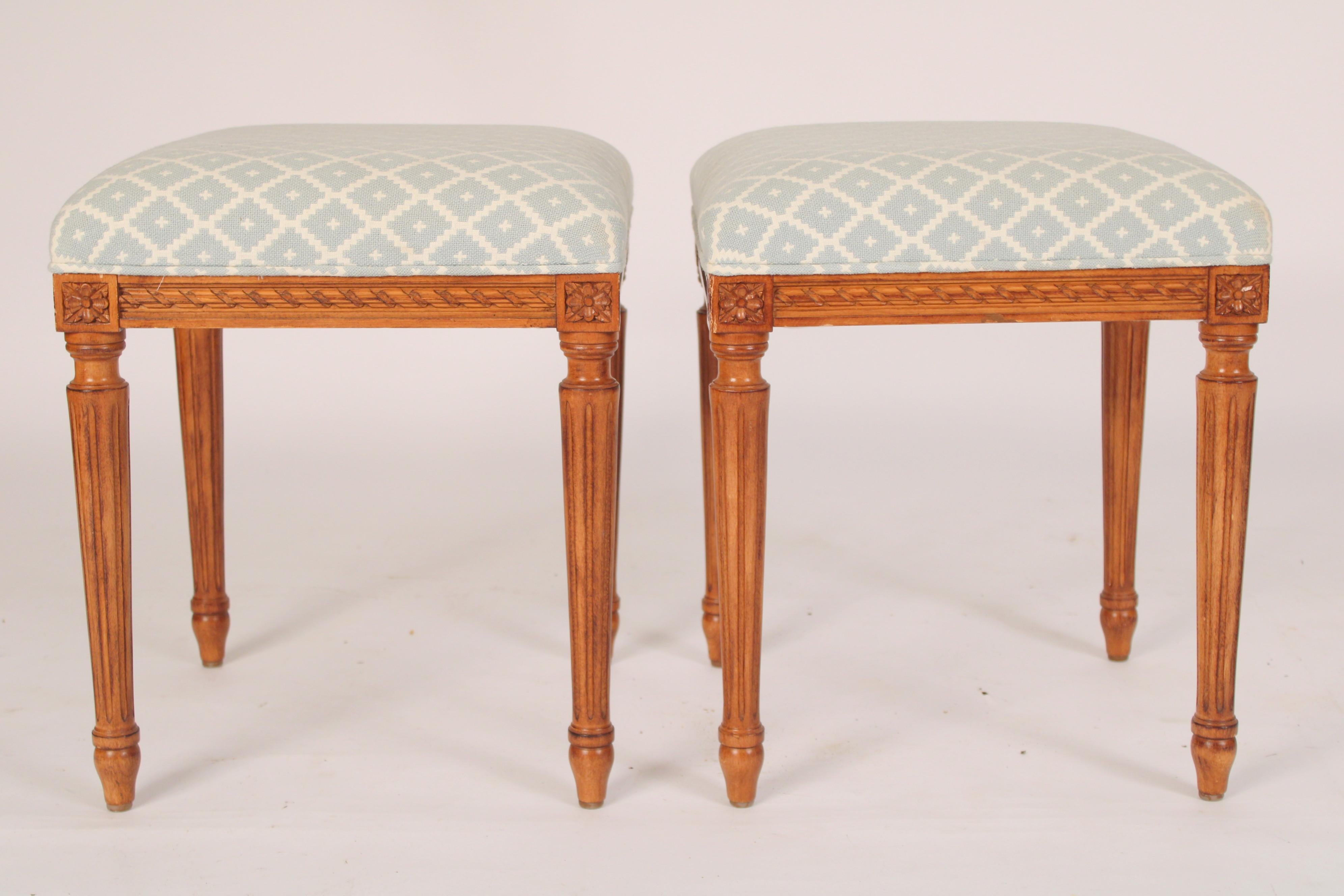 Pair of Louis XVI style carved beech wood benches, circa mid 20th century. Recently re upholstered.
