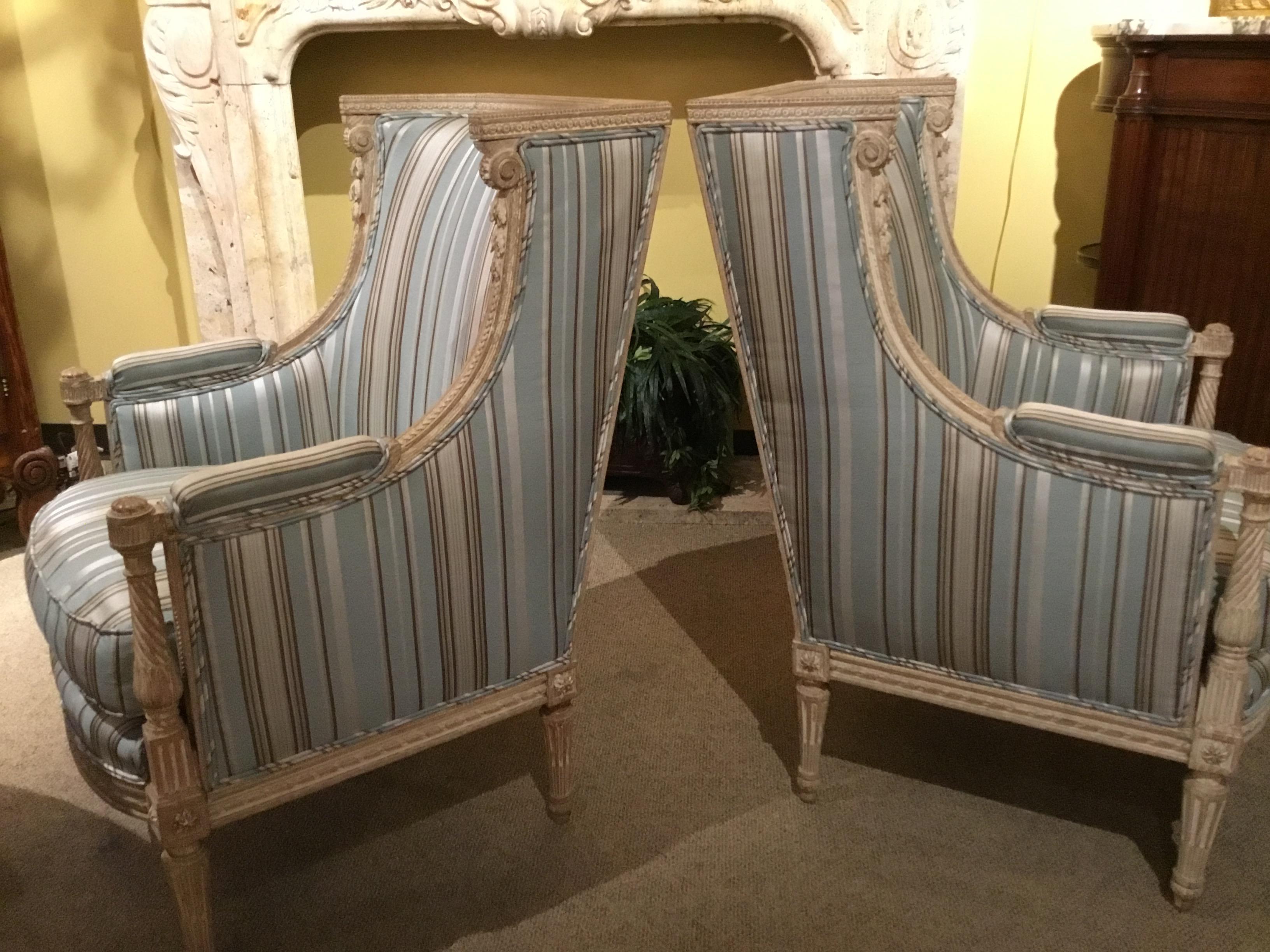 Late 19th century, each with a foliate-carved and annulated box-form crest above a padded back and
Downswept sides, joined by spiral-fluted uprights to the cushioned seats, raised on stop-fluted 

Tapering circular legs ending in toupie feet.