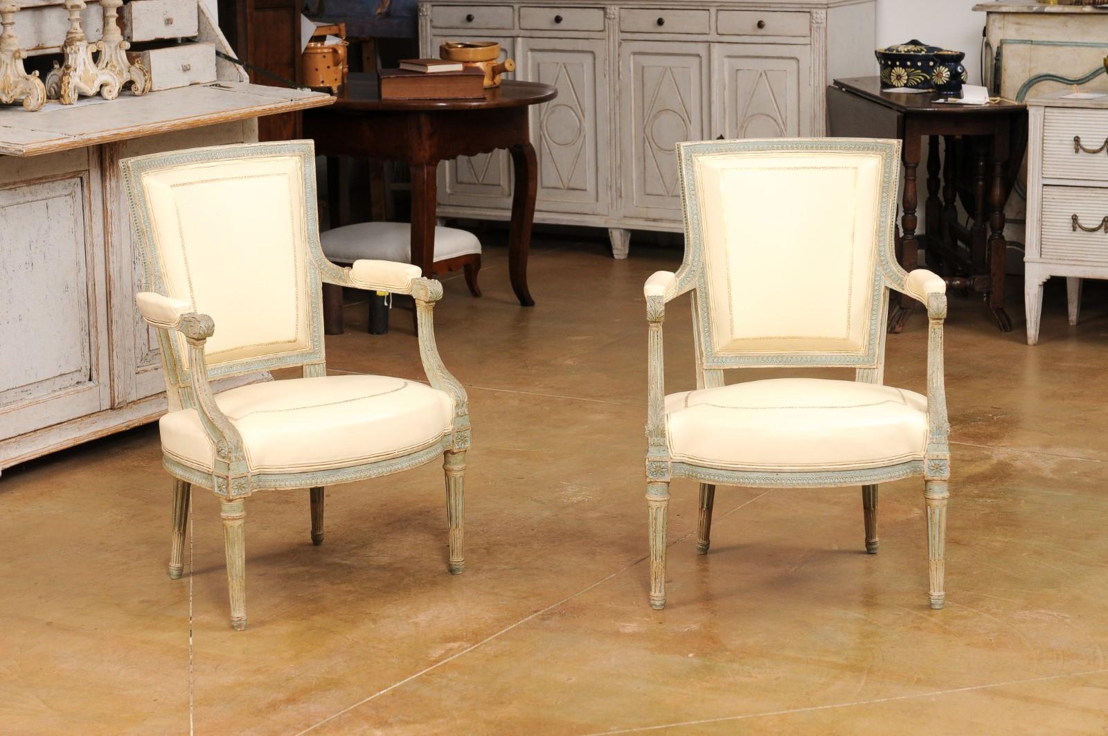 French Pair of Louis XVI Style Blue Grey Painted Armchairs Covered in White Leather For Sale