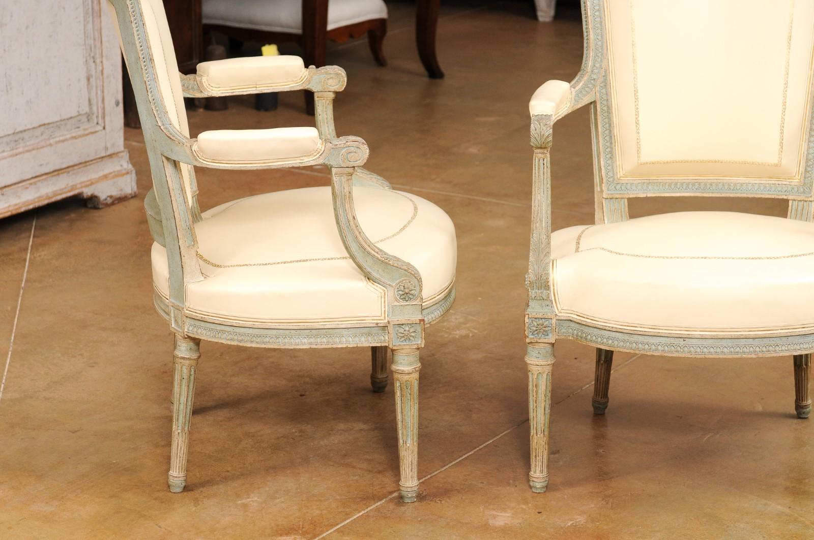20th Century Pair of Louis XVI Style Blue Grey Painted Armchairs Covered in White Leather For Sale