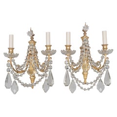Paire d'appliques de style Louis XVI en bronze et cristal