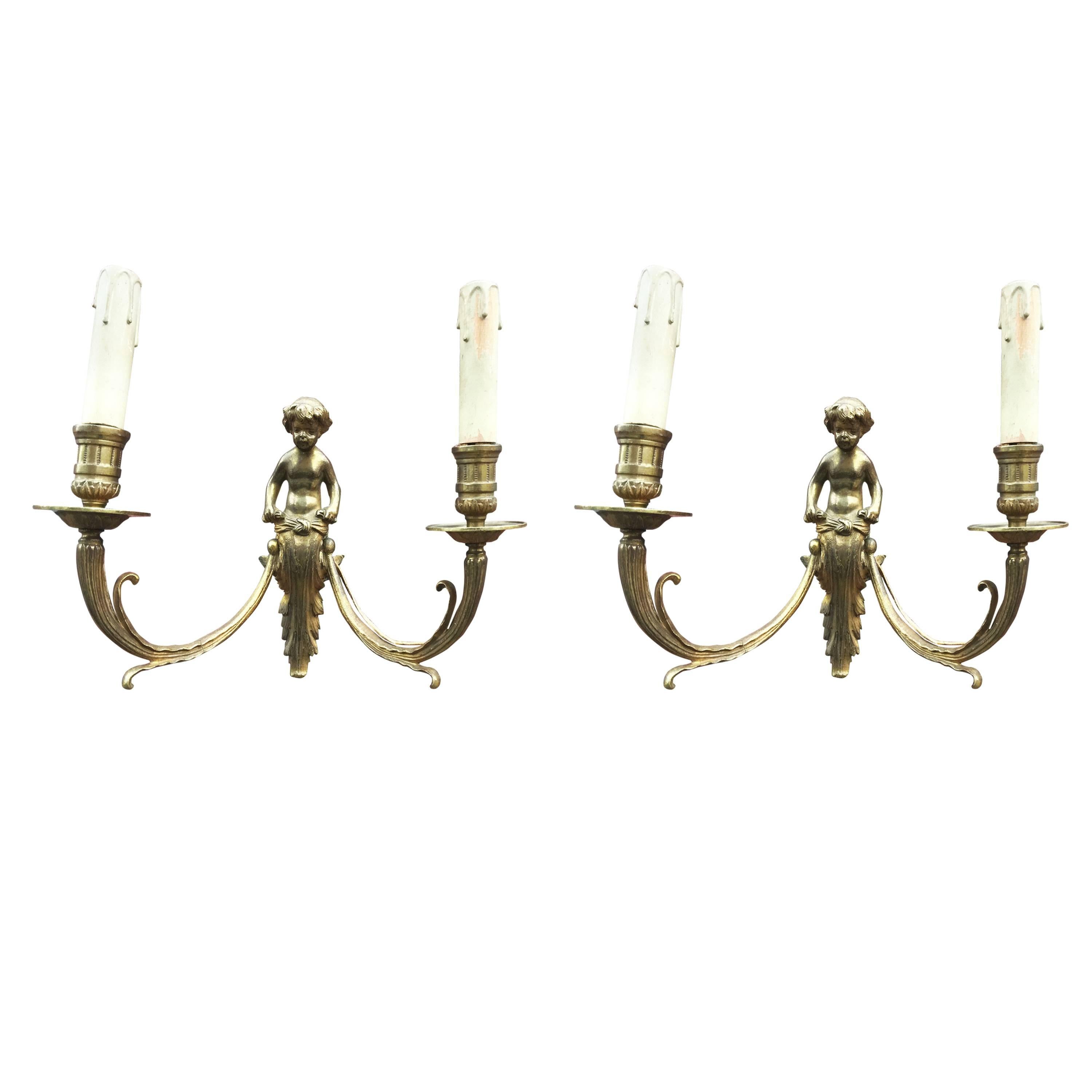 Pair of Louis XVI style bronze sconces circa 1930.