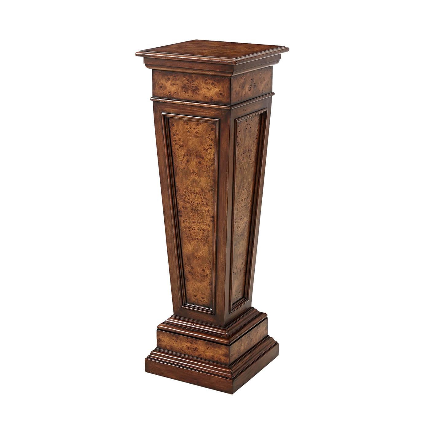 A Classical poplar burl panel tapered pedestal, with a square top and a stepped plinth base. The original Louis XVI.

Dimensions: 14