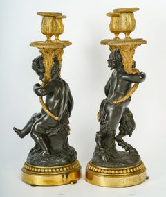 Paire de candélabres de style Louis XVI en bronze ciselé, doré et patiné