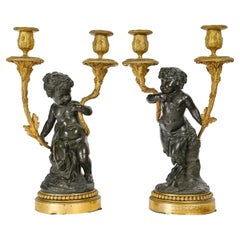 Pair of Louis XVI Style Candelabras in Chased, Gilded and Patinated Bronze