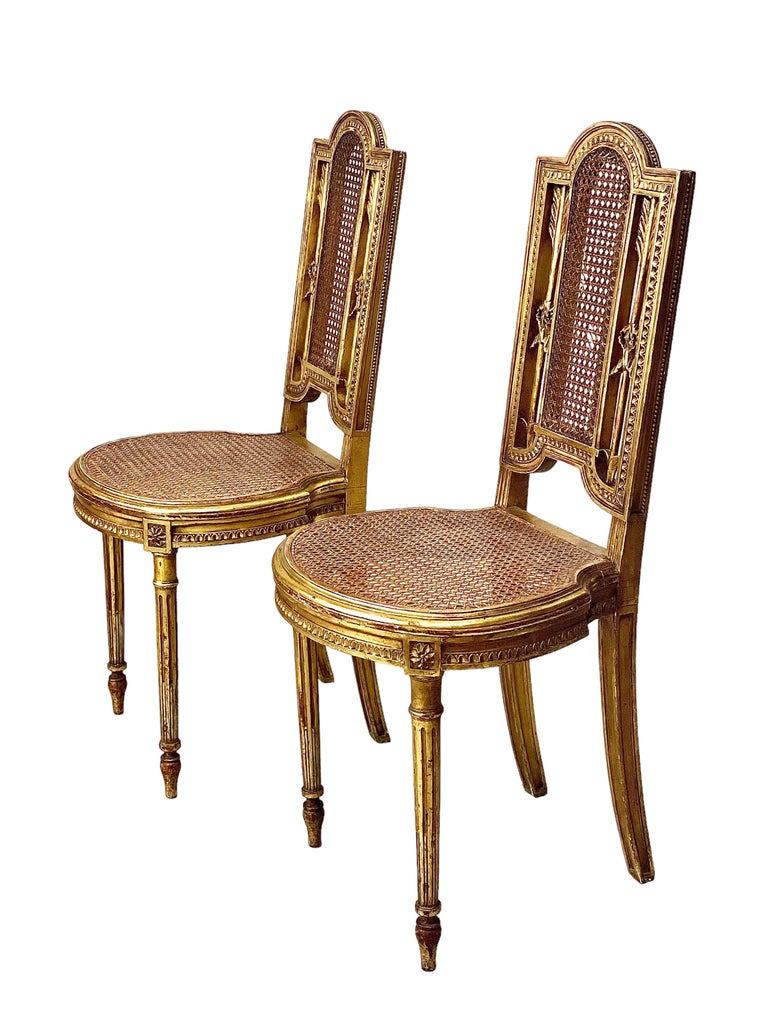 Pair of Louis XVI Style Caned and Gilded Chairs For Sale at 1stDibs