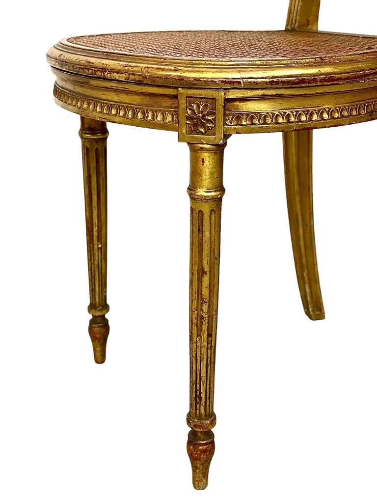 Pair of Louis XVI Style Caned and Gilded Chairs For Sale at 1stDibs