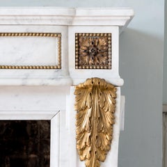 Pair of Louis XVI Style Carrara Marble and Ormolu Mounted Fireplaces