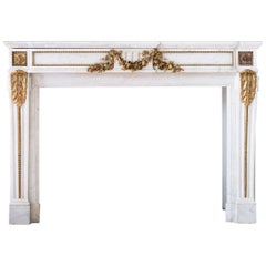 Pair of Louis XVI Style Carrara Marble and Ormolu Mounted Fireplaces