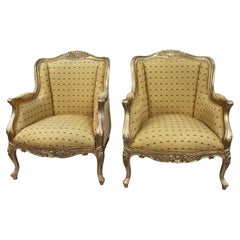 Pair of Louis XVI Style Carved Gilt Bergère Armchairs