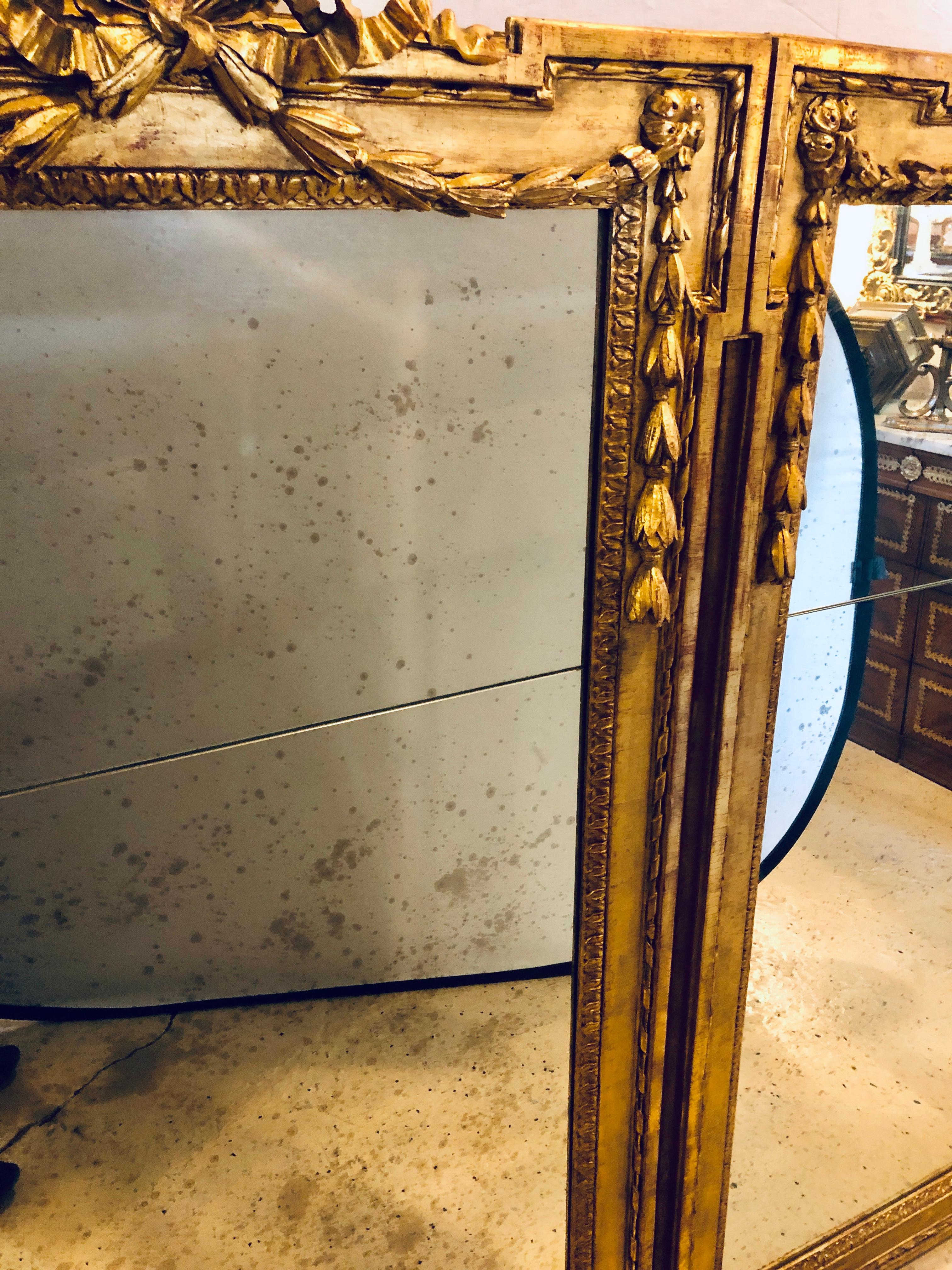 Pair of Louis XVI Style Carved Gilt Gold Wooden Wall or Console/Floor Mirrors In Good Condition In Stamford, CT