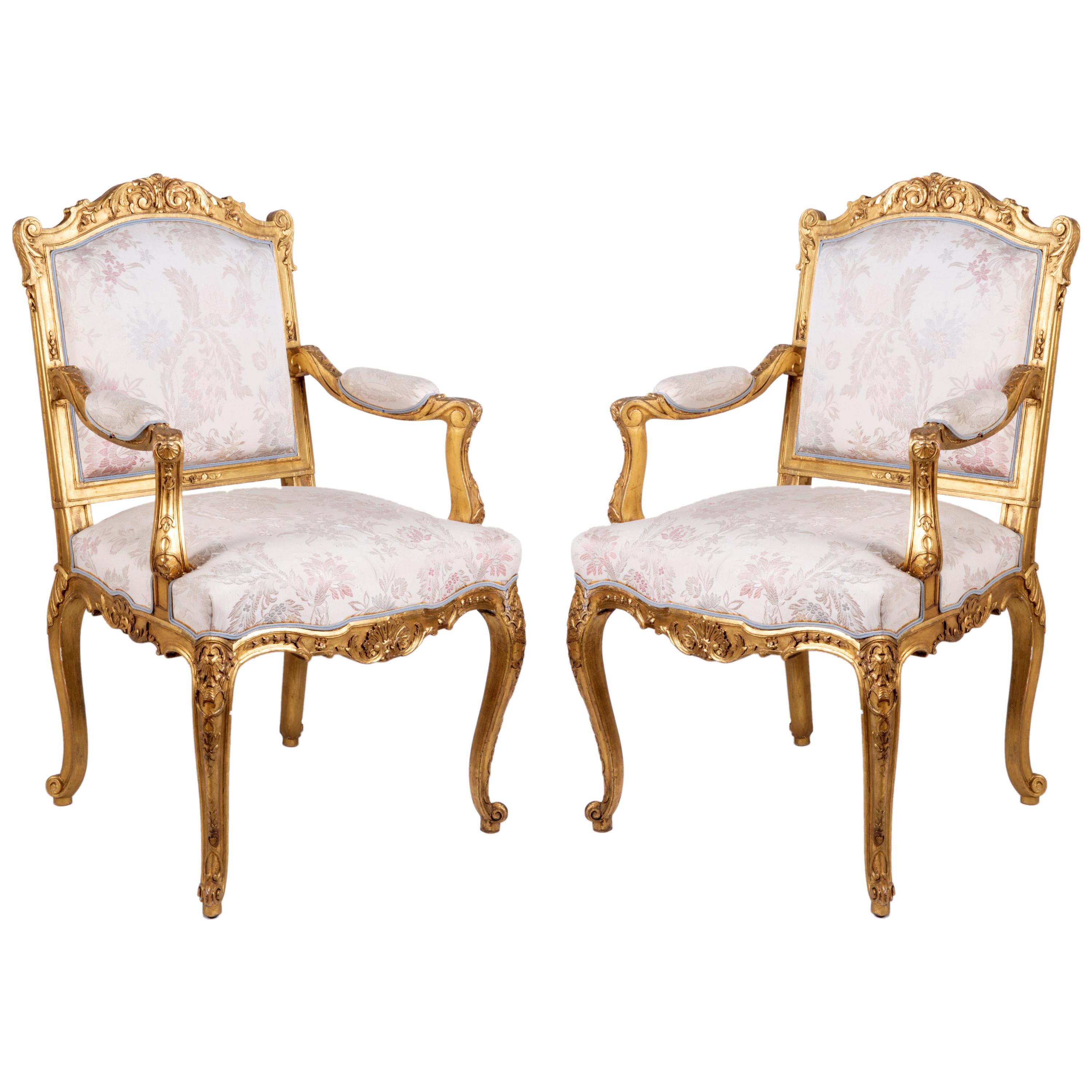Pair of Louis XVI Style Carved Giltwood Armchairs, by Mellier & Co