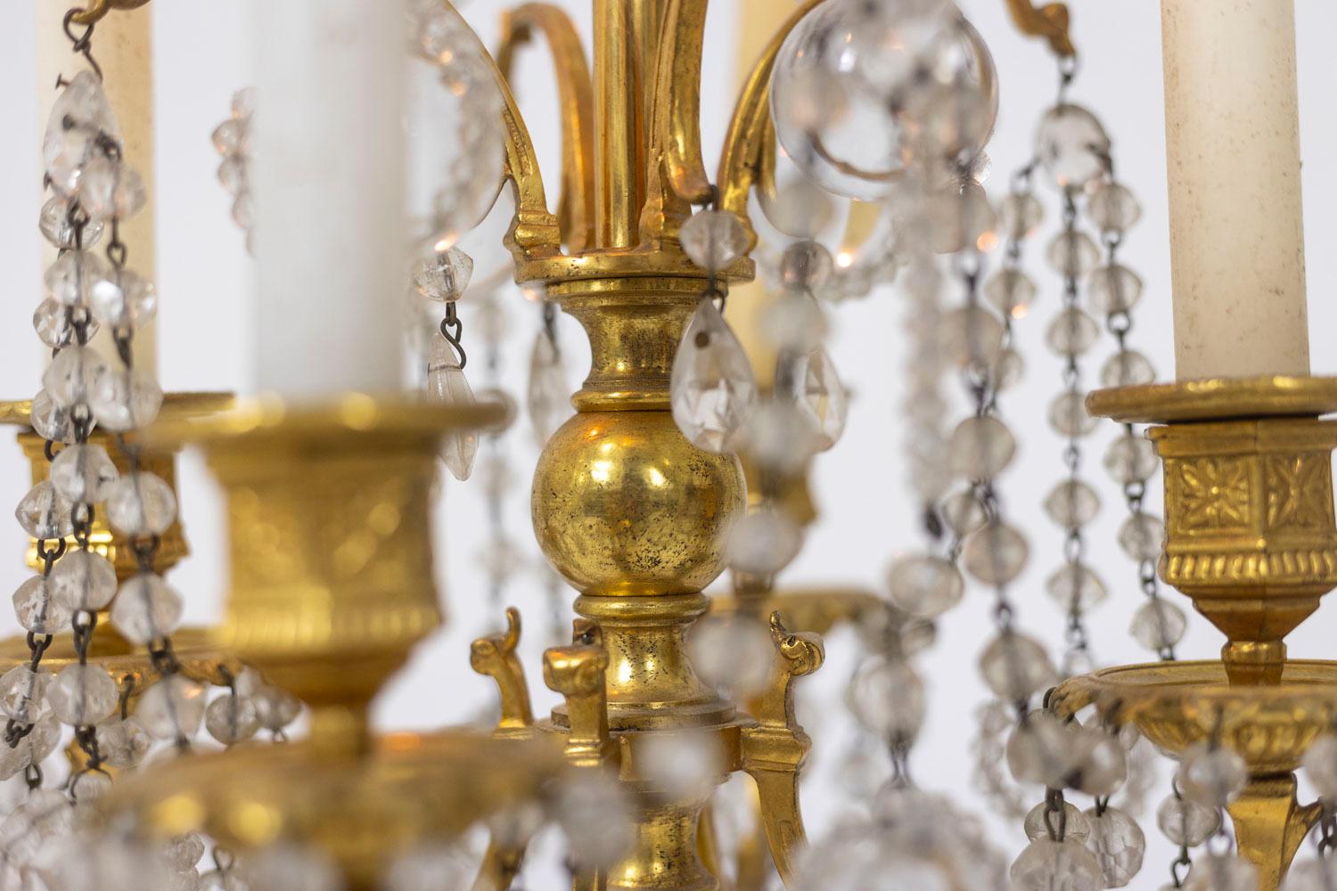 19th Century Pair of Louis XVI style chandeliers in bronze and crystal, circa 1900 For Sale