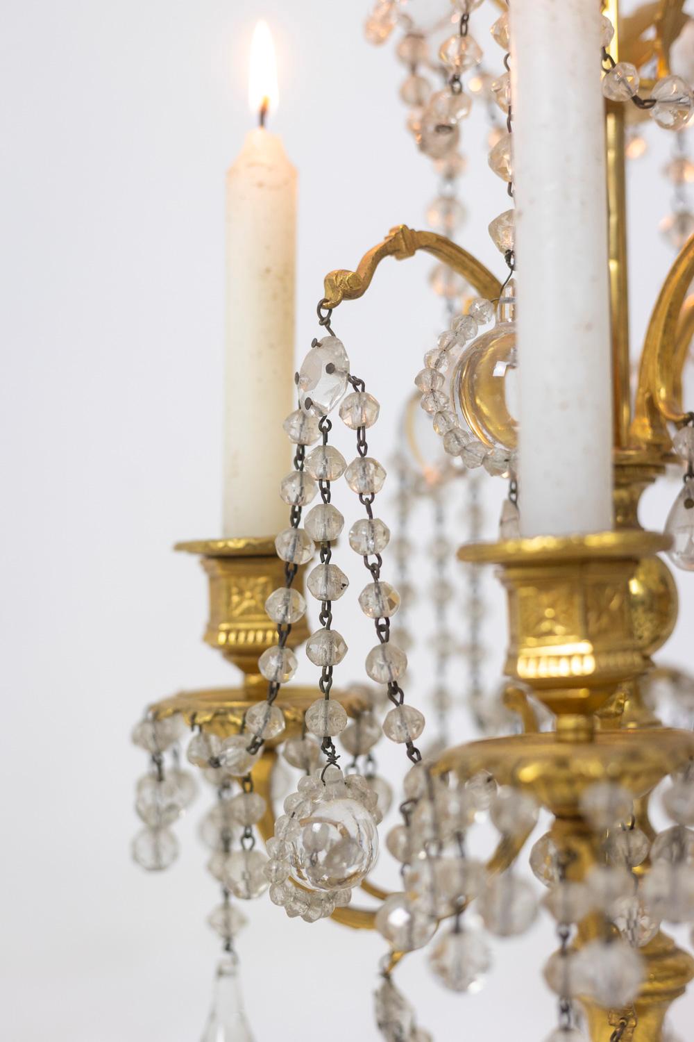 Bronze Pair of Louis XVI style chandeliers in bronze and crystal, circa 1900 For Sale