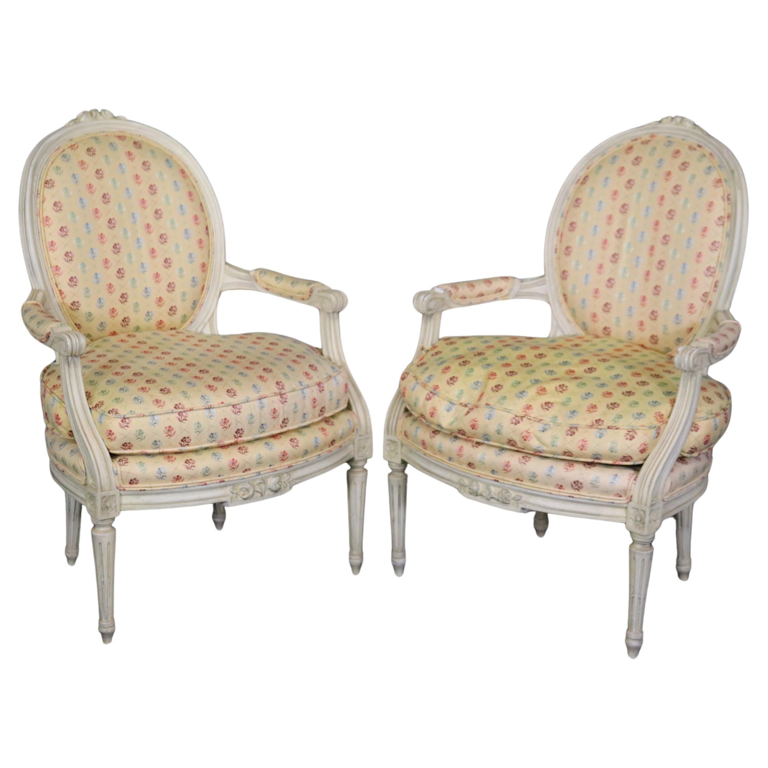 Pair of Louis XVI Style Creme Paint Decorated Armchairs For Sale