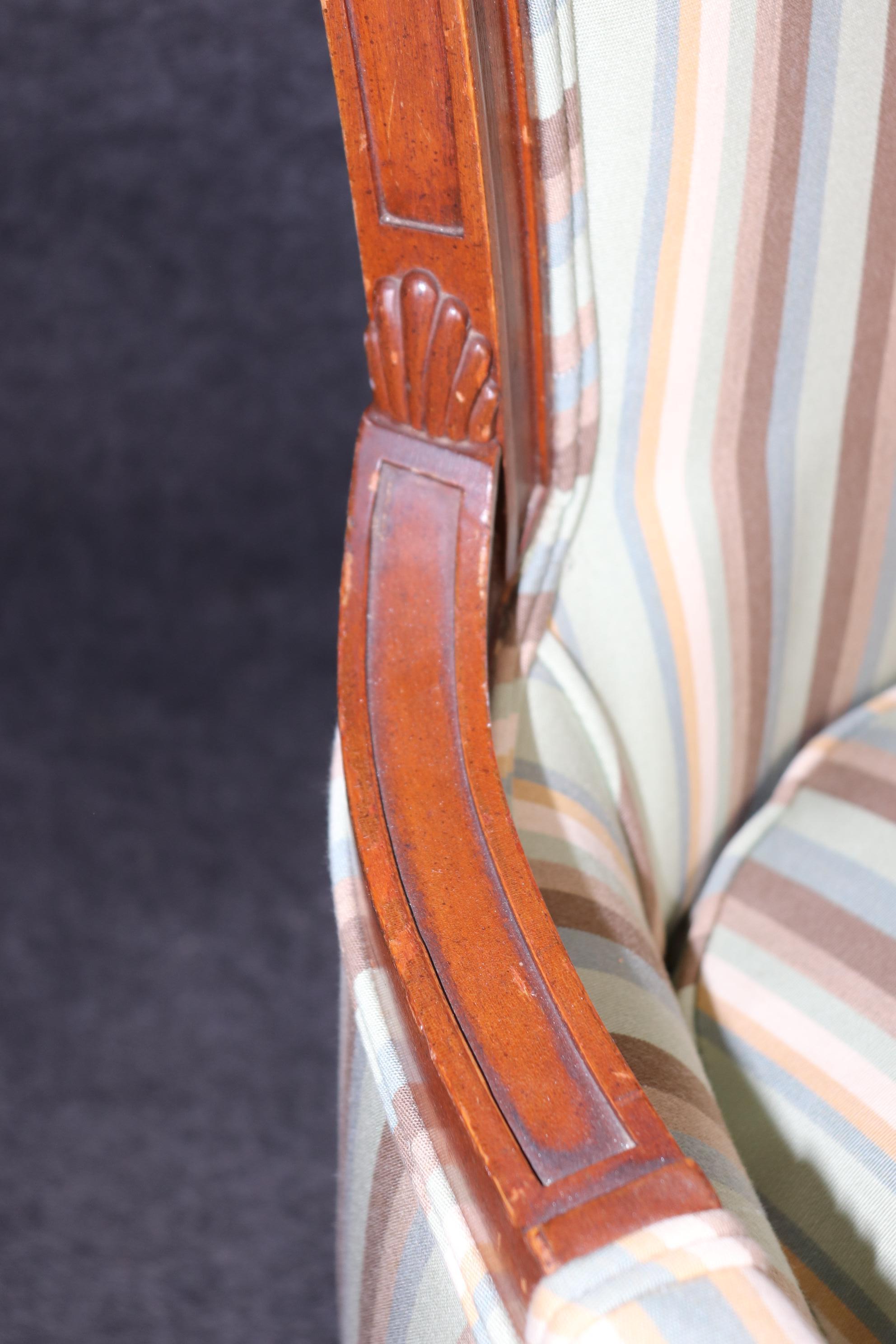 Pair of Louis XVI Style Distressed Carved Wood Bergere Chairs With Upholstery For Sale 5