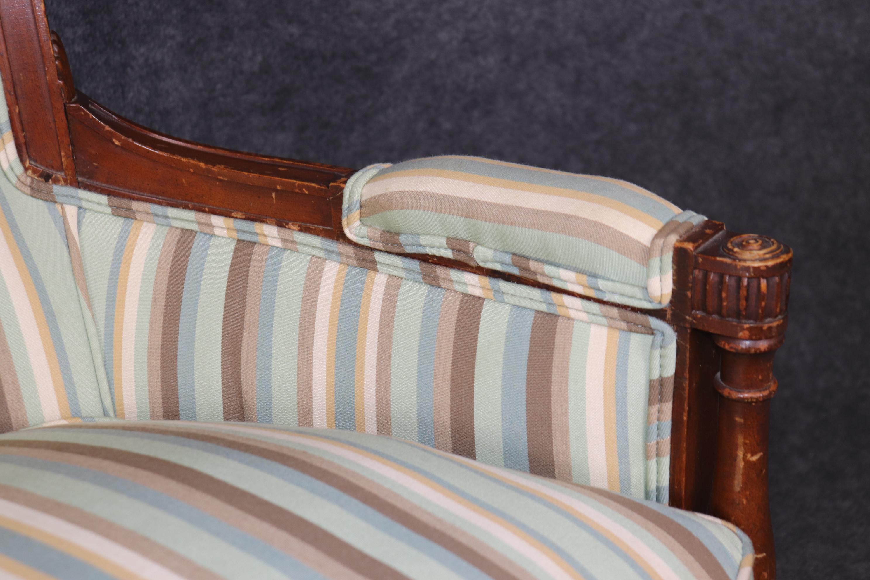 Pair of Louis XVI Style Distressed Carved Wood Bergere Chairs With Upholstery For Sale 6