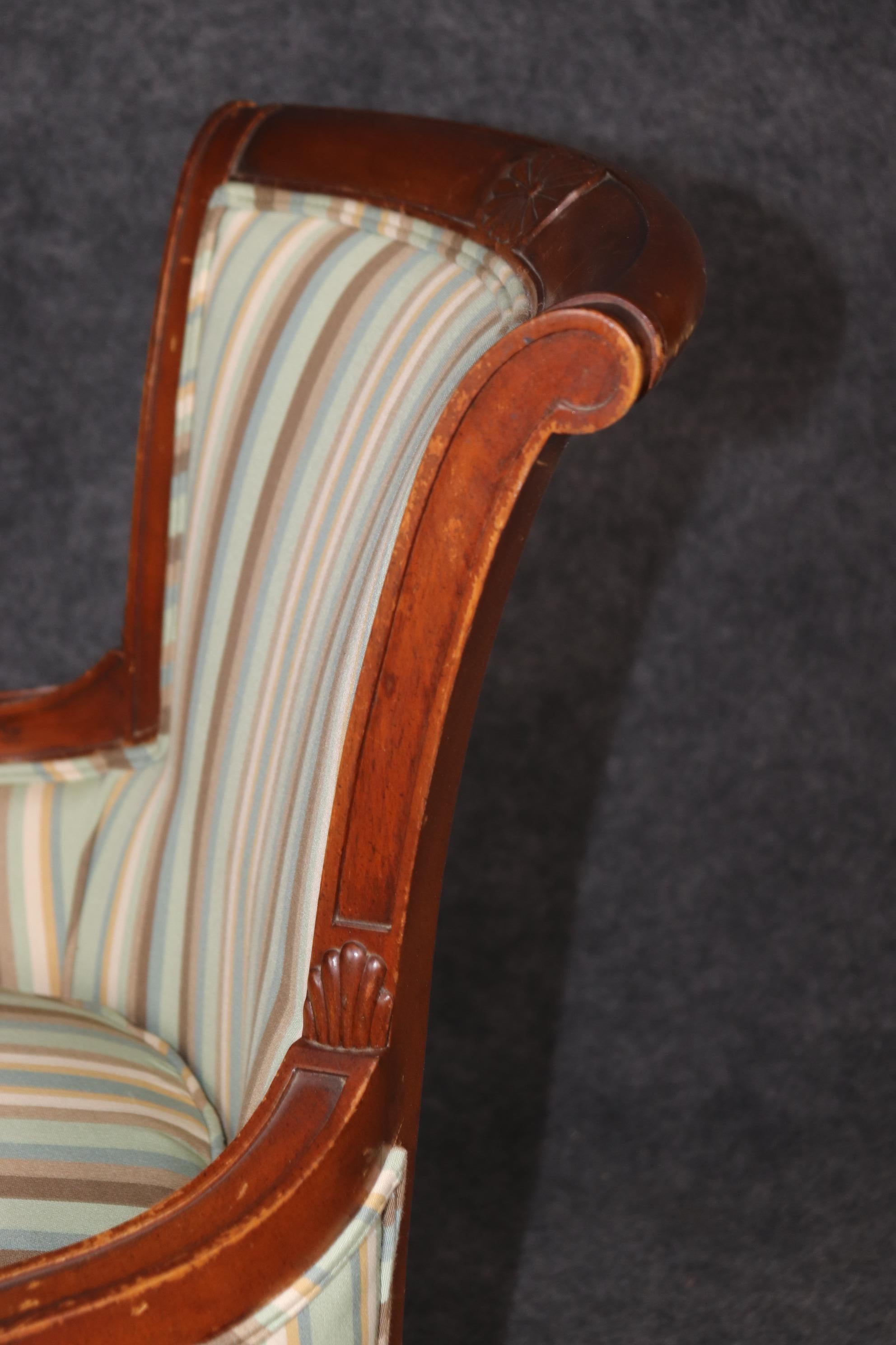 Pair of Louis XVI Style Distressed Carved Wood Bergere Chairs With Upholstery For Sale 11