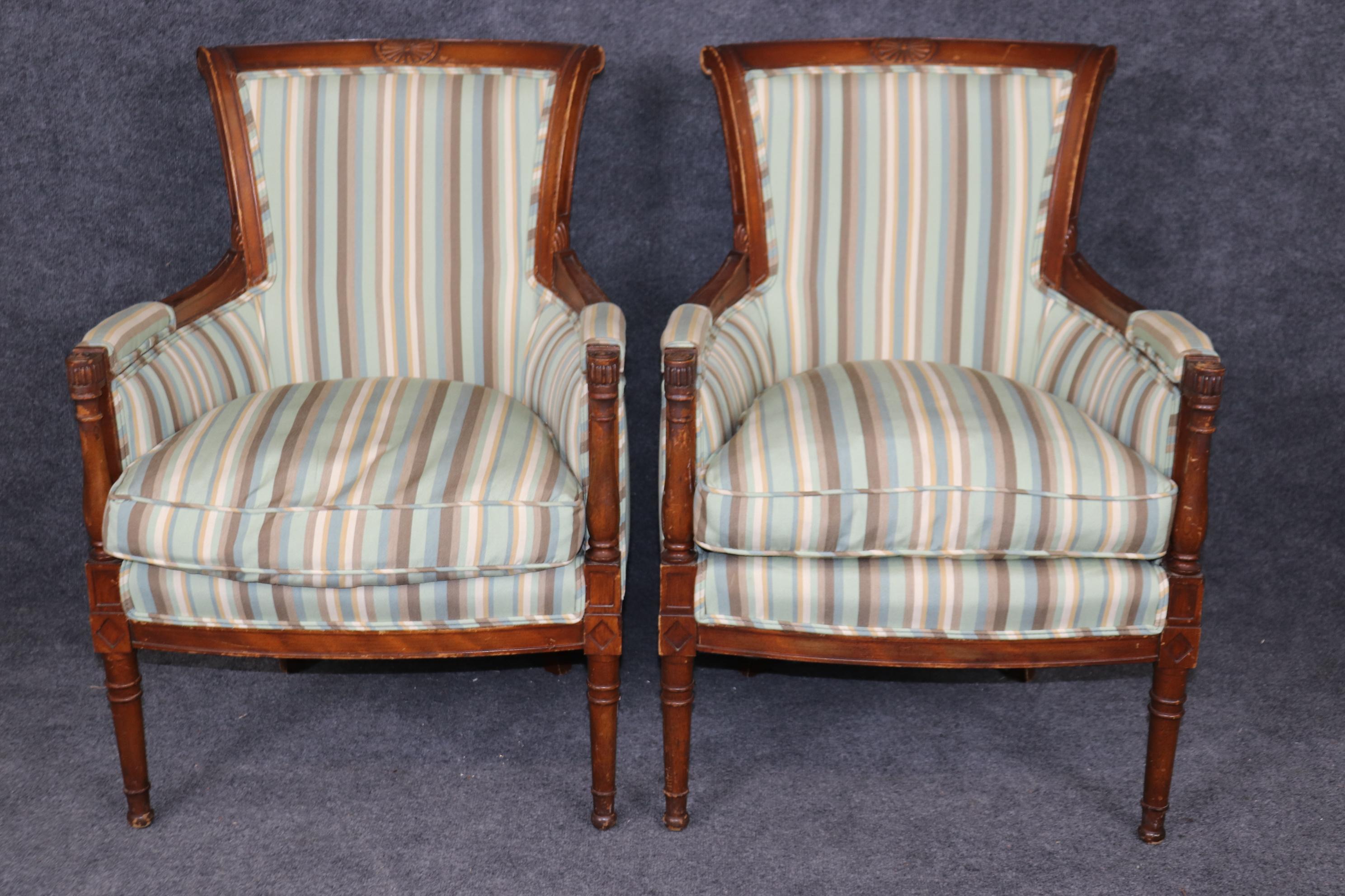Unknown Pair of Louis XVI Style Distressed Carved Wood Bergere Chairs With Upholstery For Sale