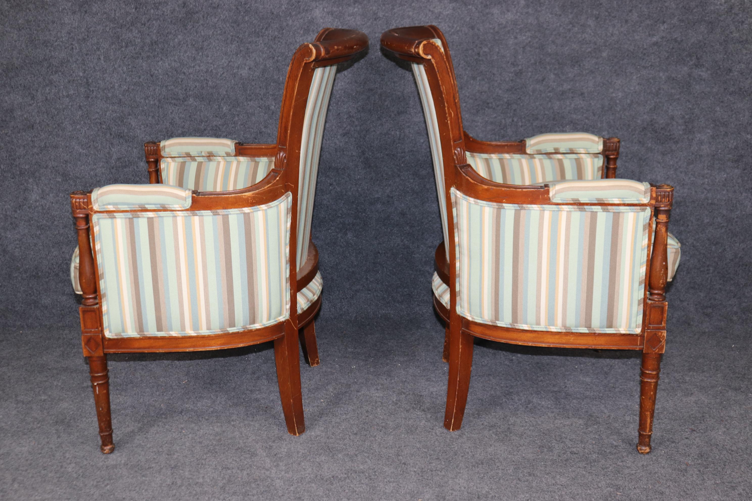 Pair of Louis XVI Style Distressed Carved Wood Bergere Chairs With Upholstery In Good Condition For Sale In Swedesboro, NJ