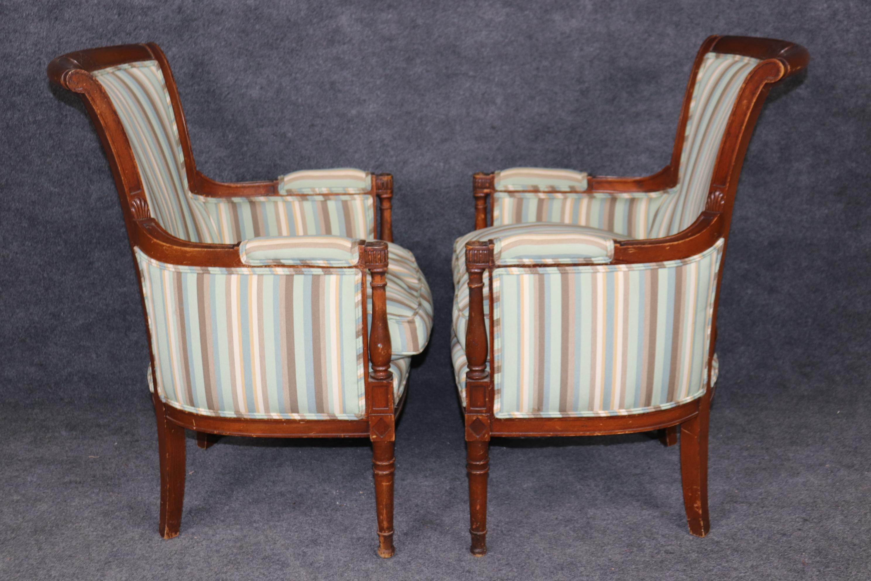 Pair of Louis XVI Style Distressed Carved Wood Bergere Chairs With Upholstery For Sale 1