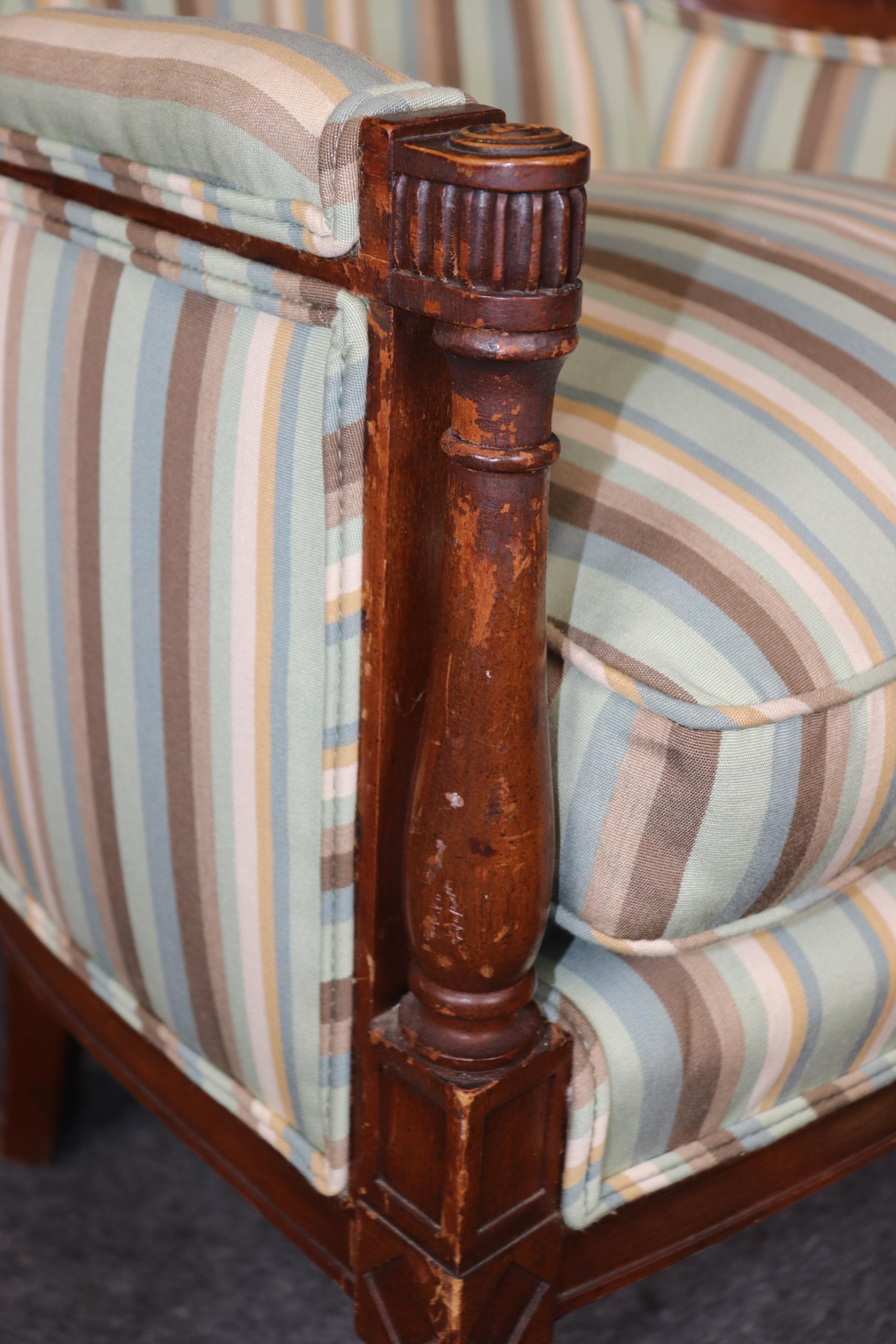 Pair of Louis XVI Style Distressed Carved Wood Bergere Chairs With Upholstery For Sale 4