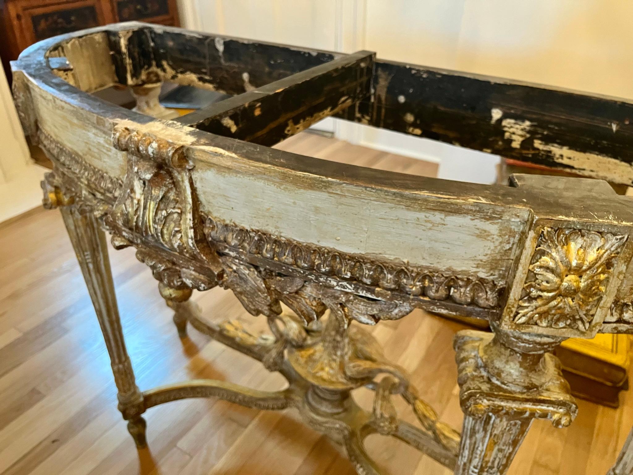 Pair Of Louis XVI Style Distressed Paint and Parcel Gilt Marble Topped Consoles In Distressed Condition In Nashville, TN