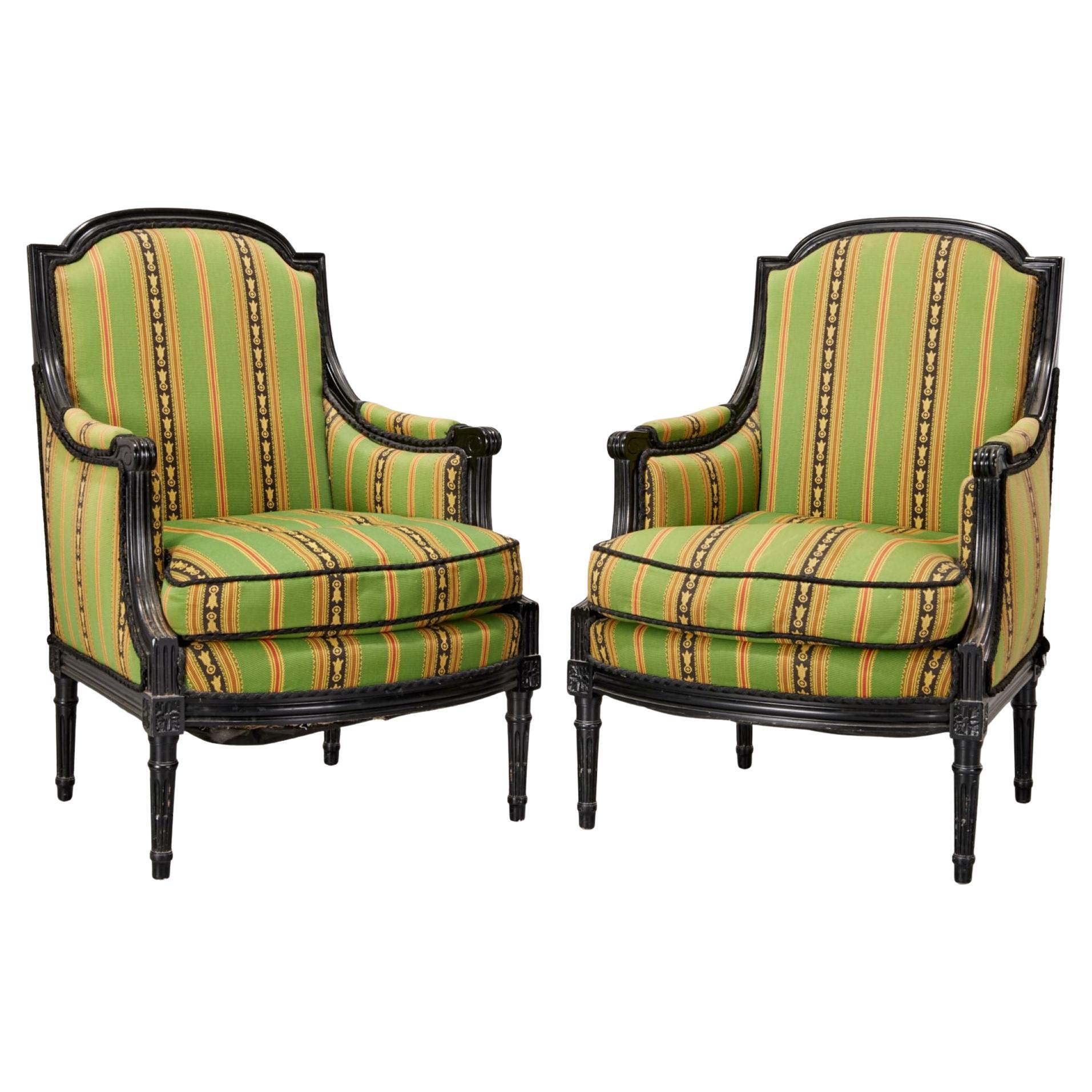 Pair of Louis XVI Style Ebonized Bergères with Green Striped Silk, Early 20th C. For Sale