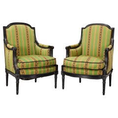 Pair of Louis XVI Style Ebonized Bergères with Green Striped Silk, Early 20th C.