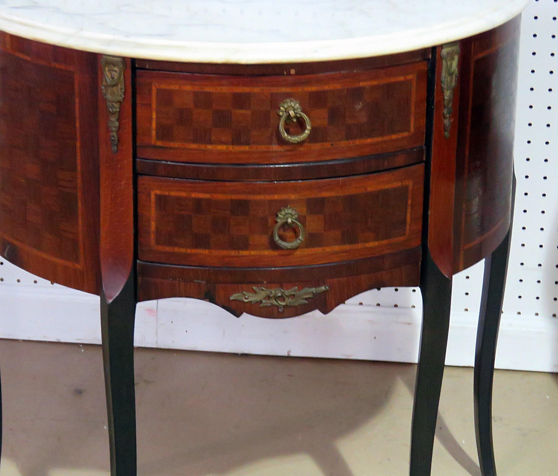 Pair of Louis XV style inlaid marble-top end tables with two drawers.