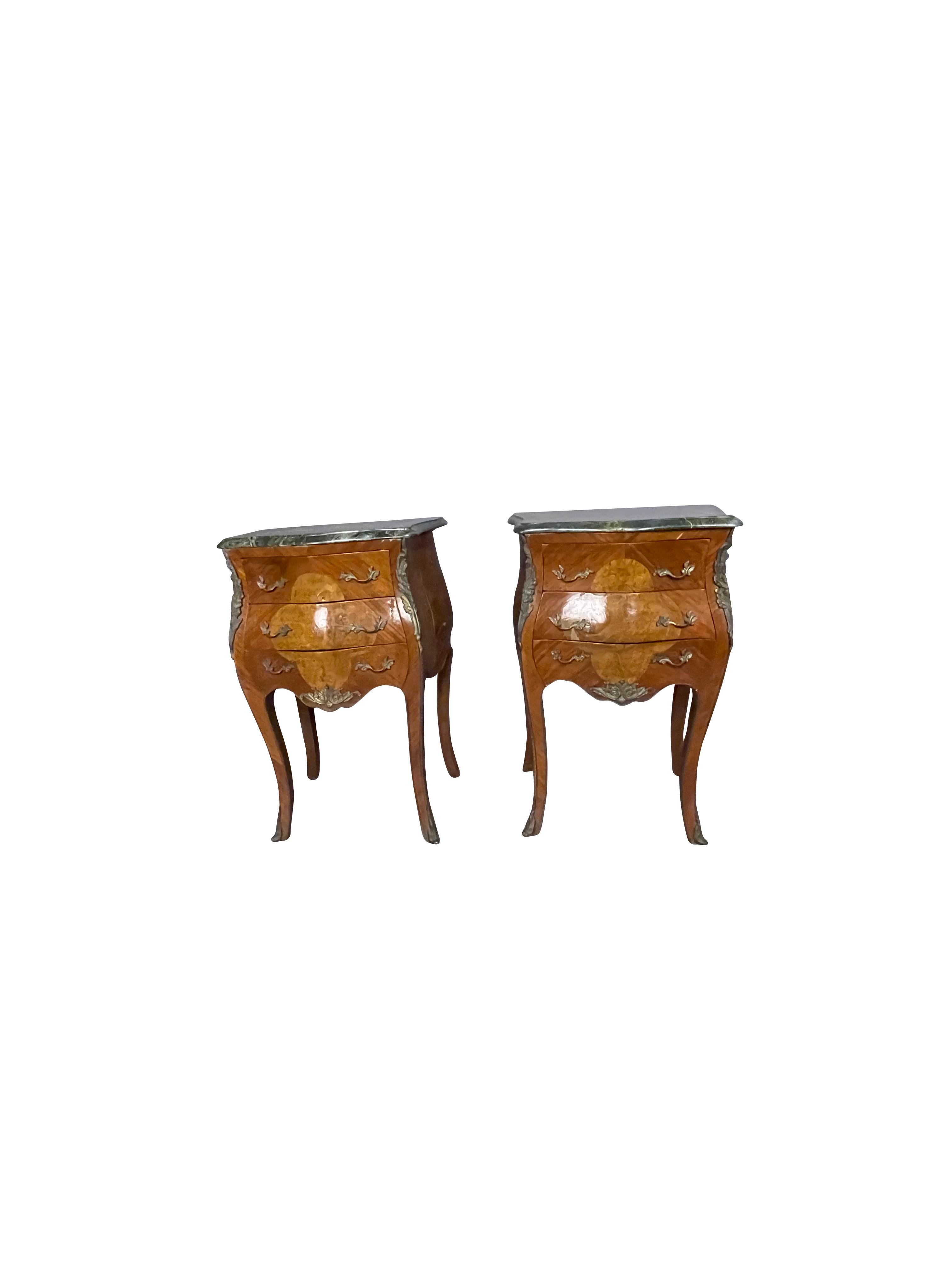 Classic Louis XVI style end table or nightstands with classic ormolu mounts and green marble tops. Wonderful patina to the veneer.