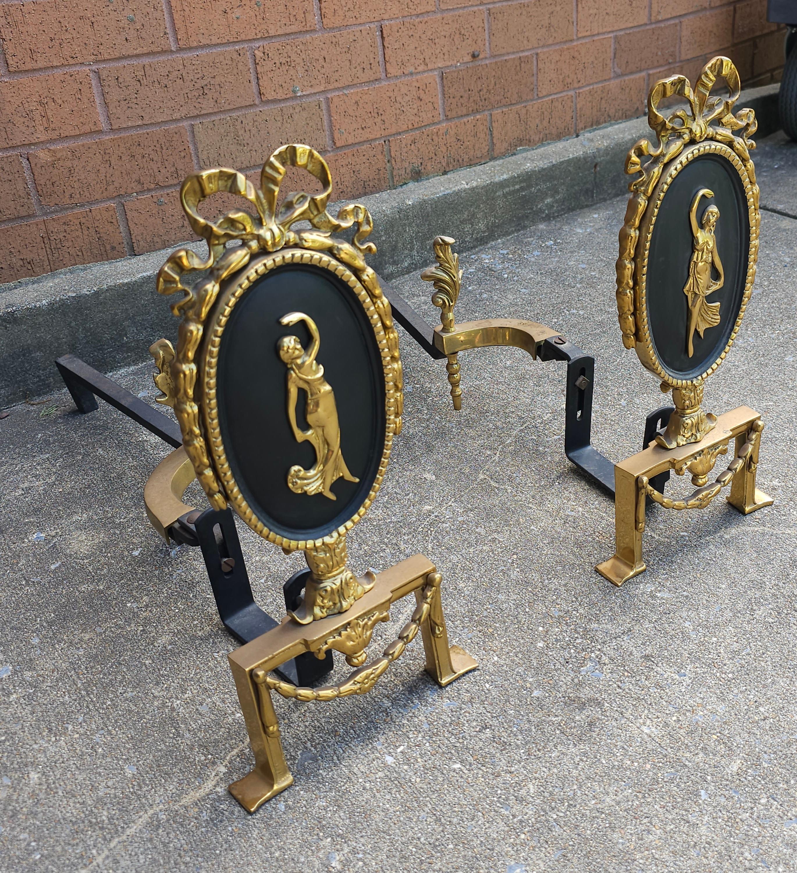 Metalwork Pair of Louis XVI Style Figural Brass and Iron Ribbon Decorated  Andirons For Sale