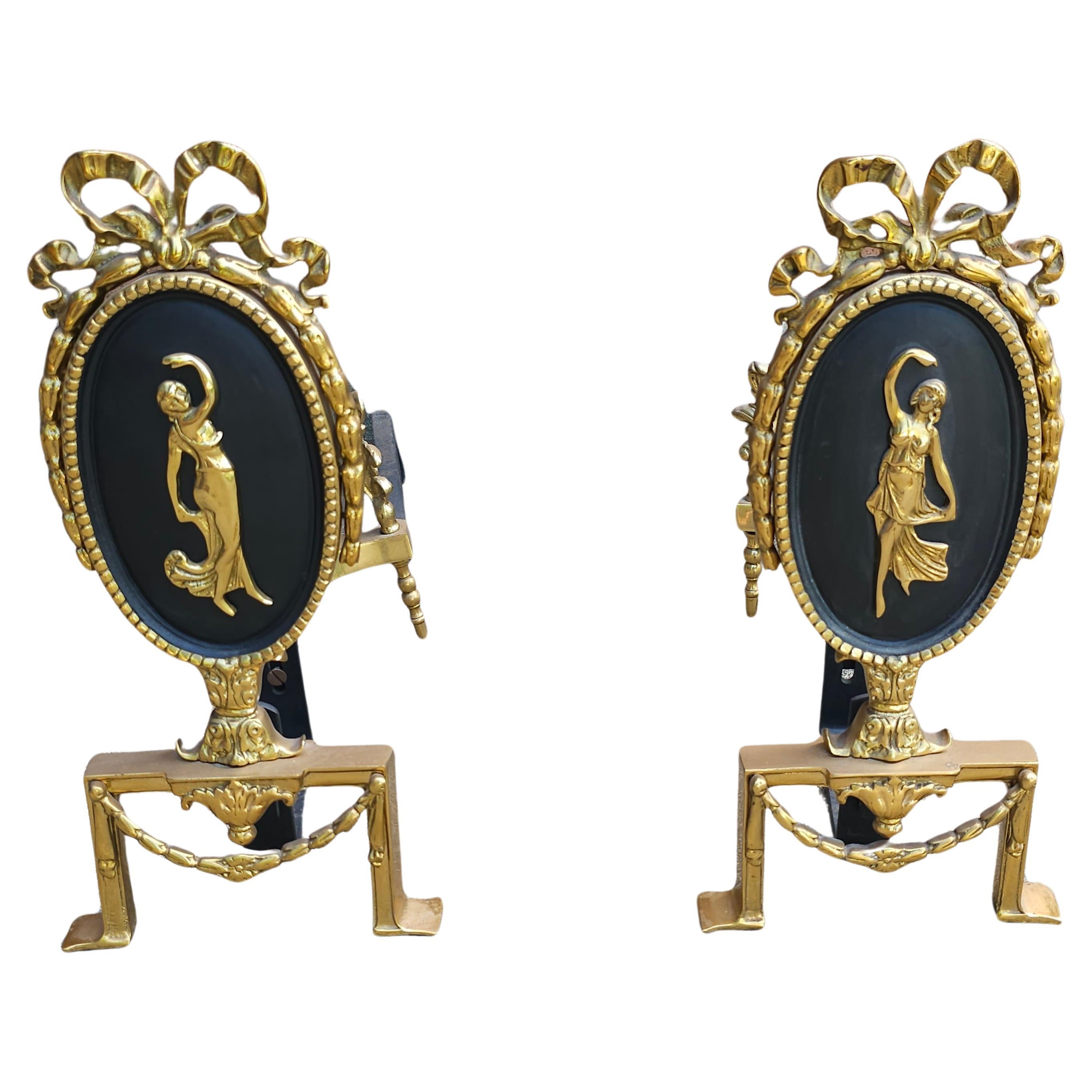Pair of Louis XVI Style Figural Brass and Iron Ribbon Decorated  Andirons For Sale